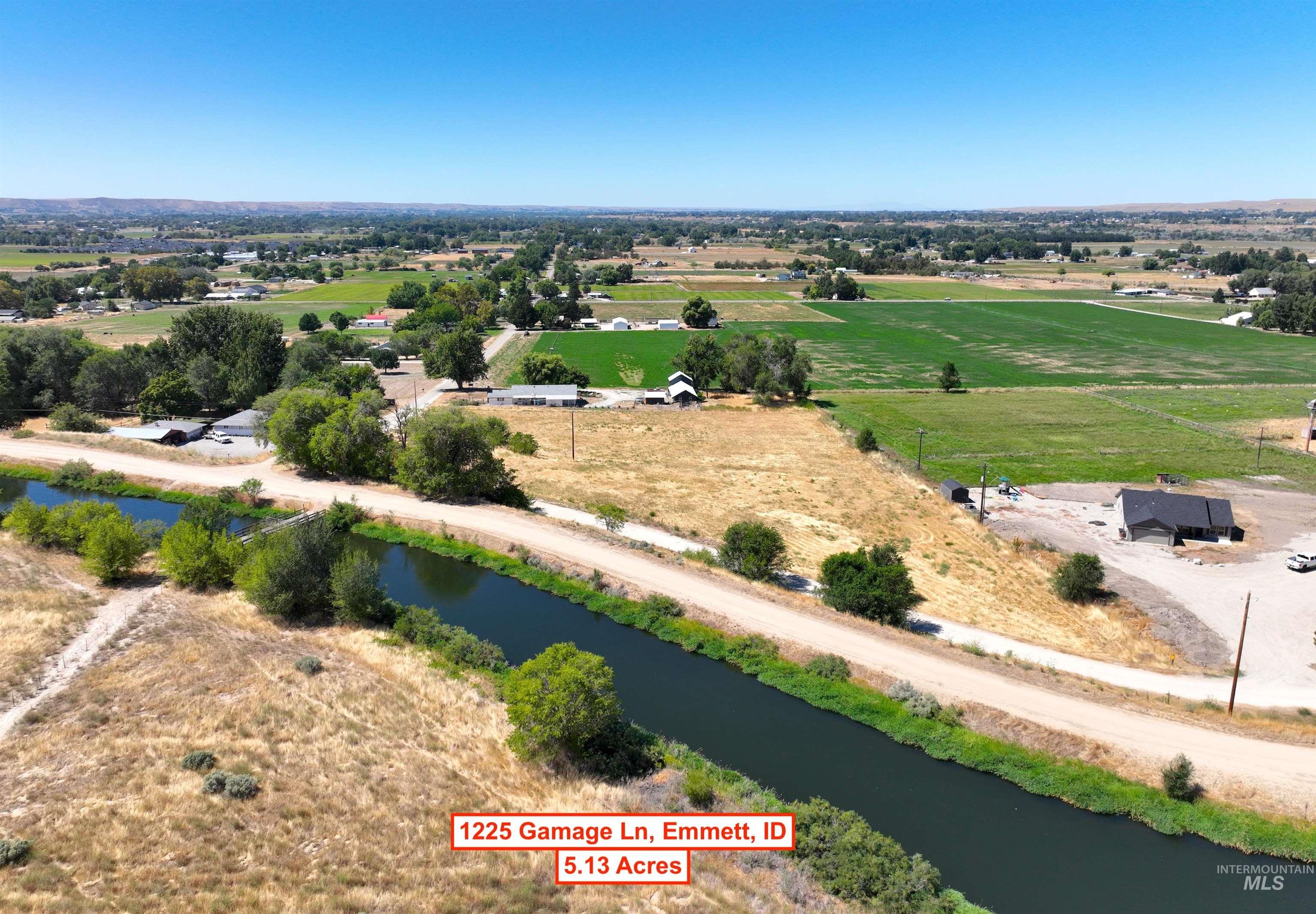 Overview of rural landscape with a nearby body of water