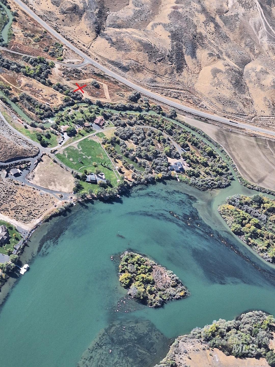 Aerial view of property's location with rural landscape