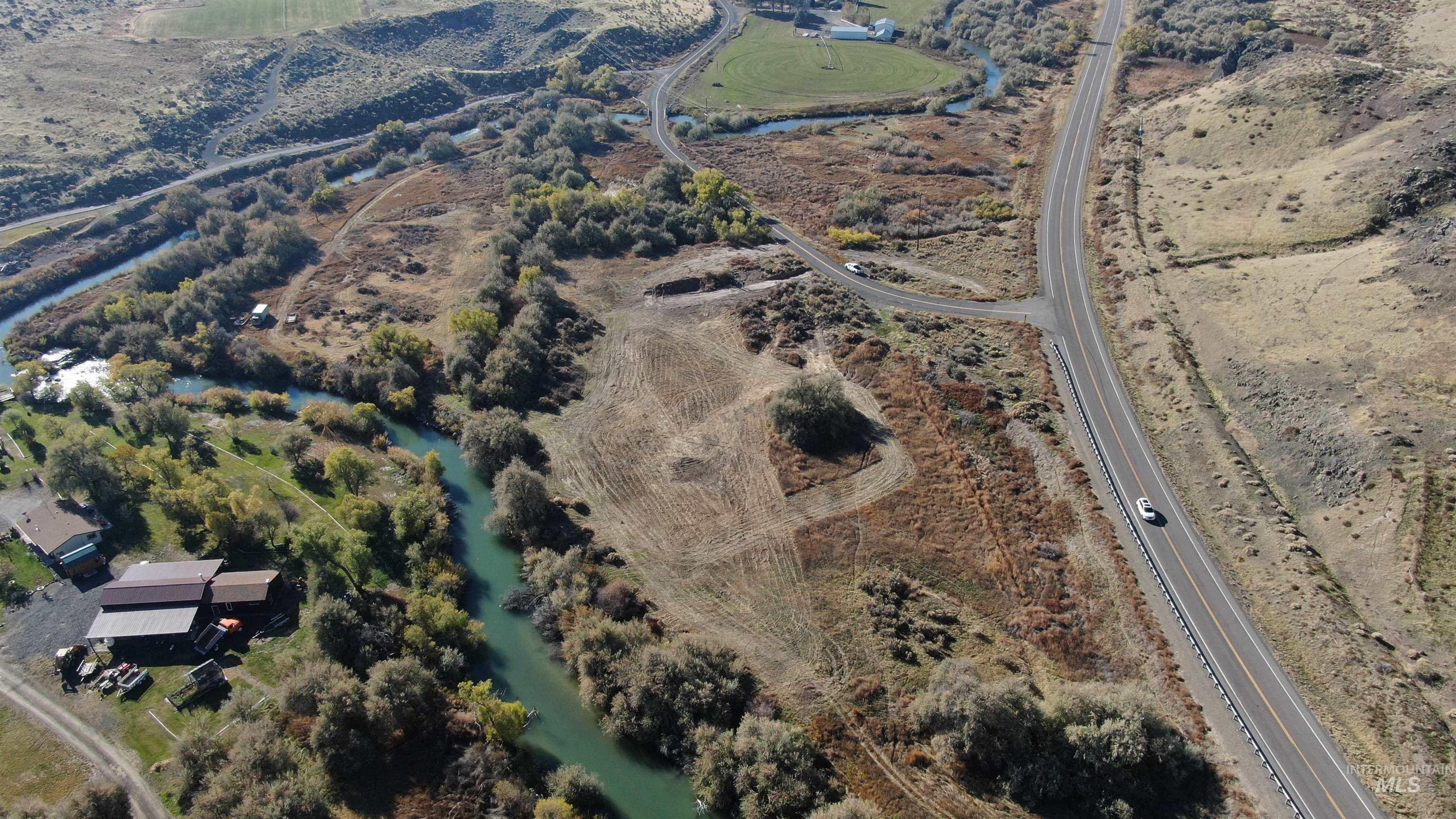 Aerial view of property's location featuring rural landscape