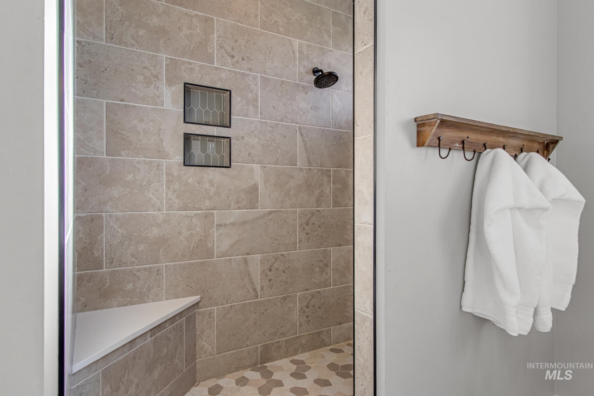 Bathroom with tiled shower