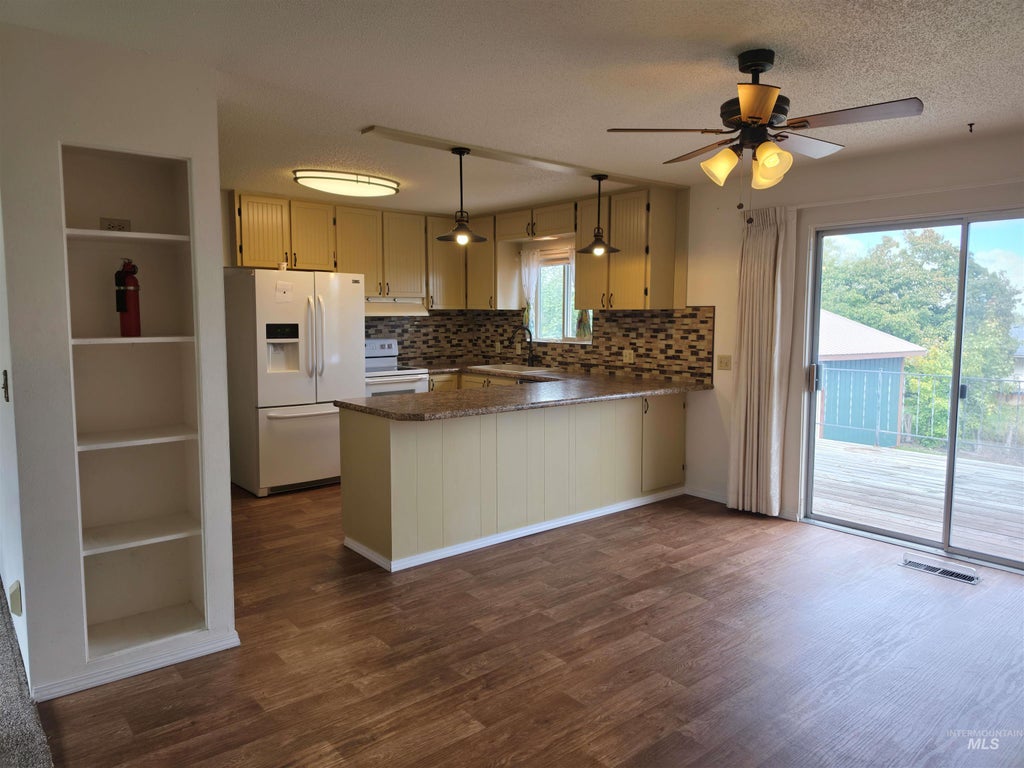Photo of 819 Lincoln Ave, Grangeville, ID 83530 (MLS # 99003847)