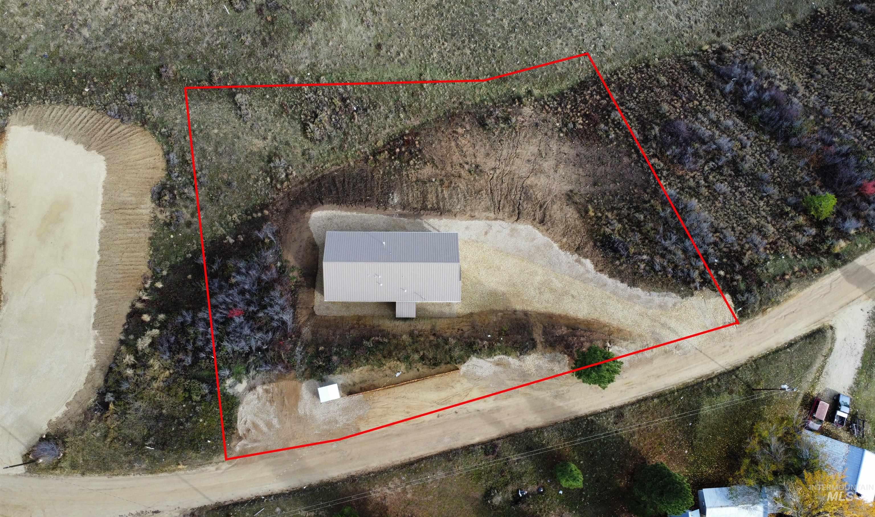 Aerial overview of property's location featuring property parcel outlined