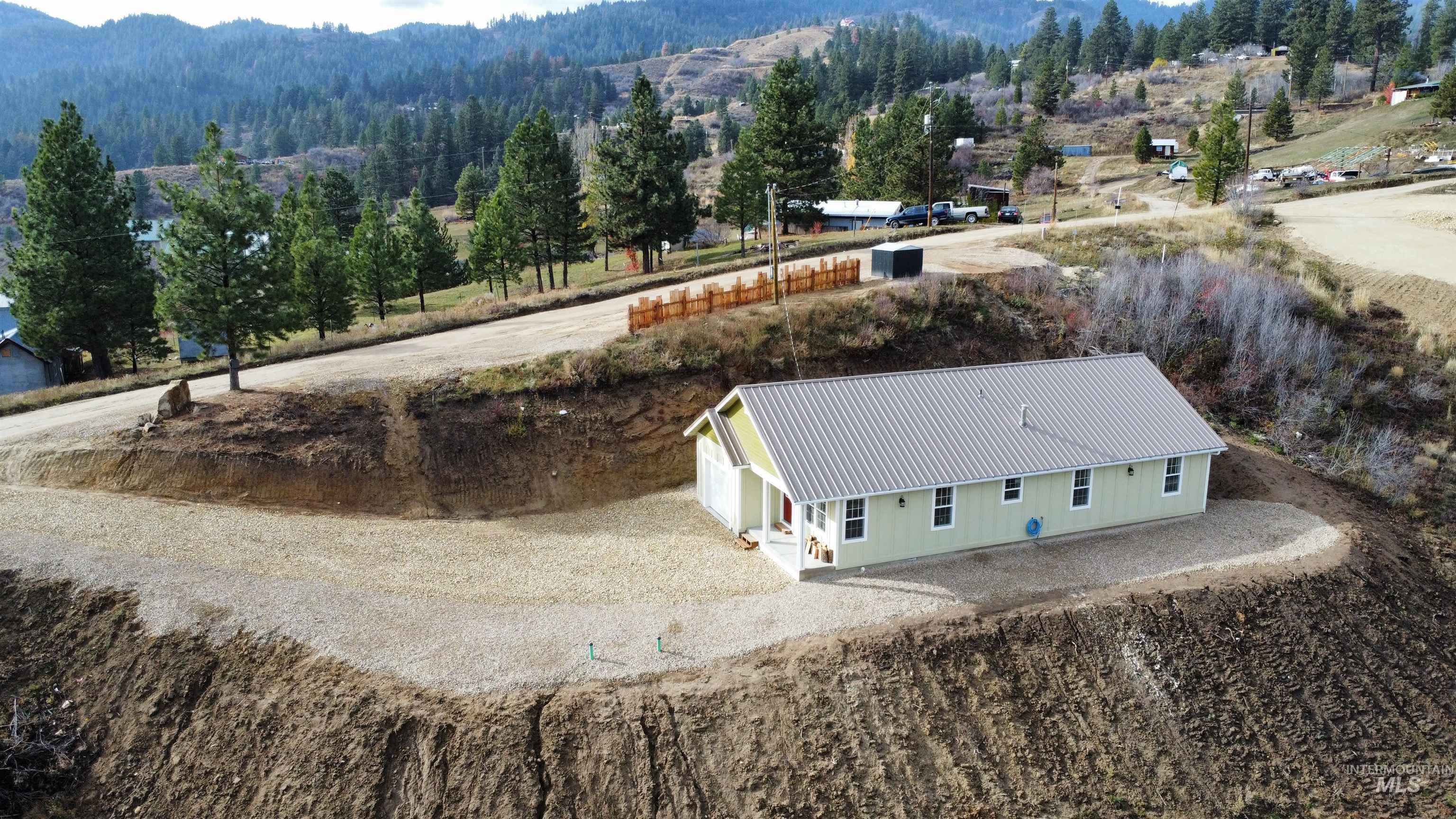 View of subject property with a mountainous background