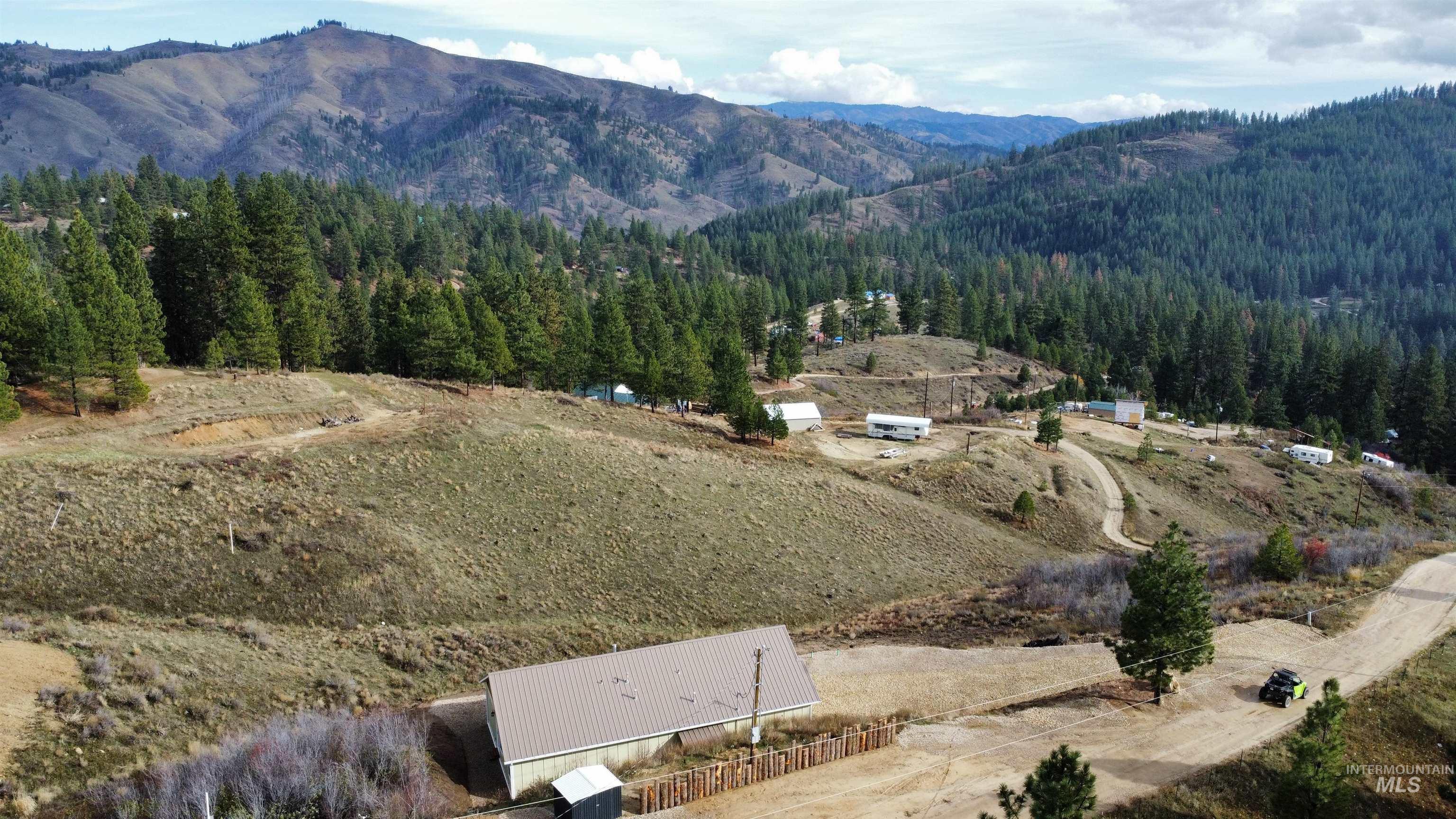 Aerial view of mountains and a heavily wooded area