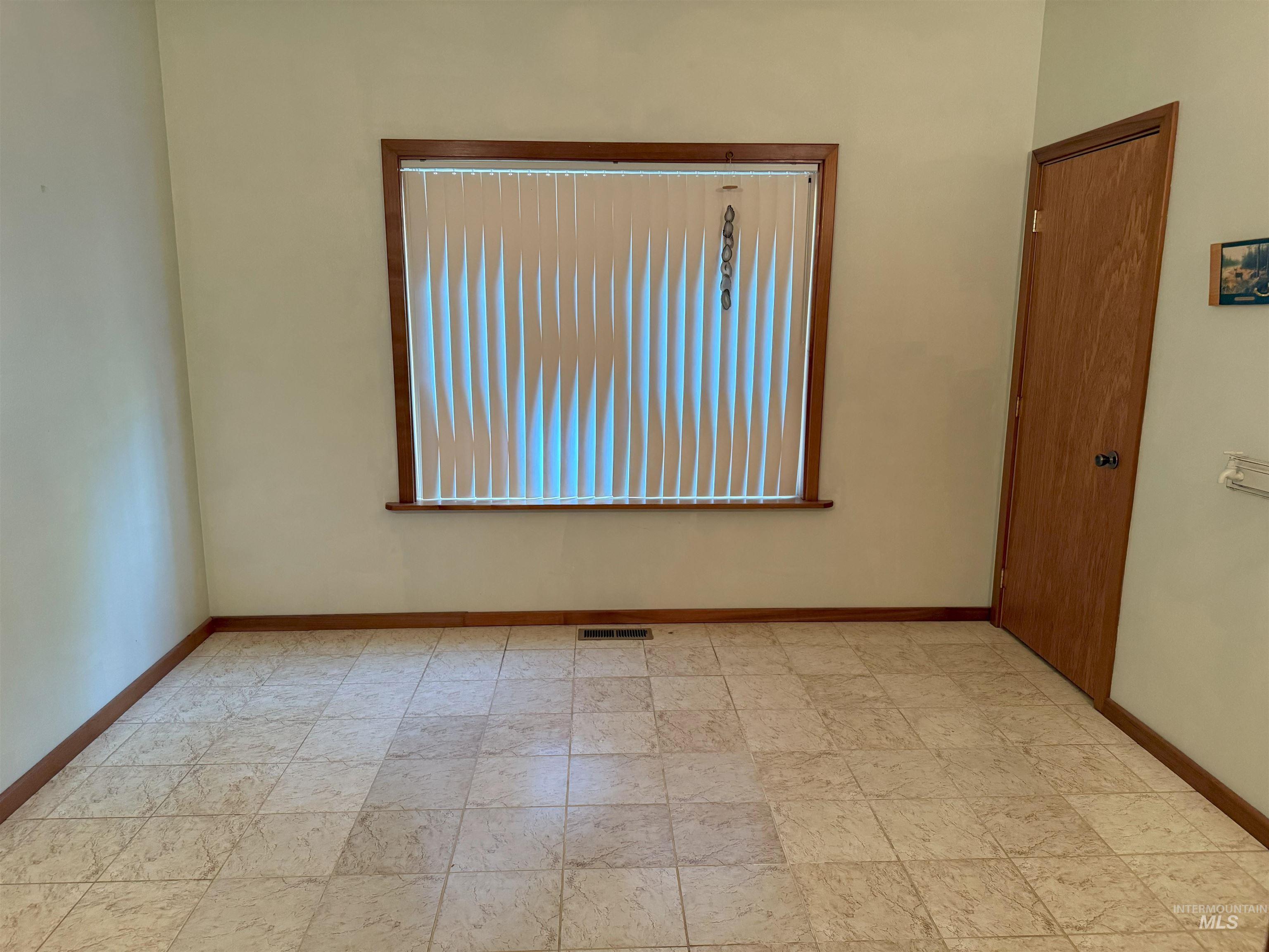 Empty room with baseboards