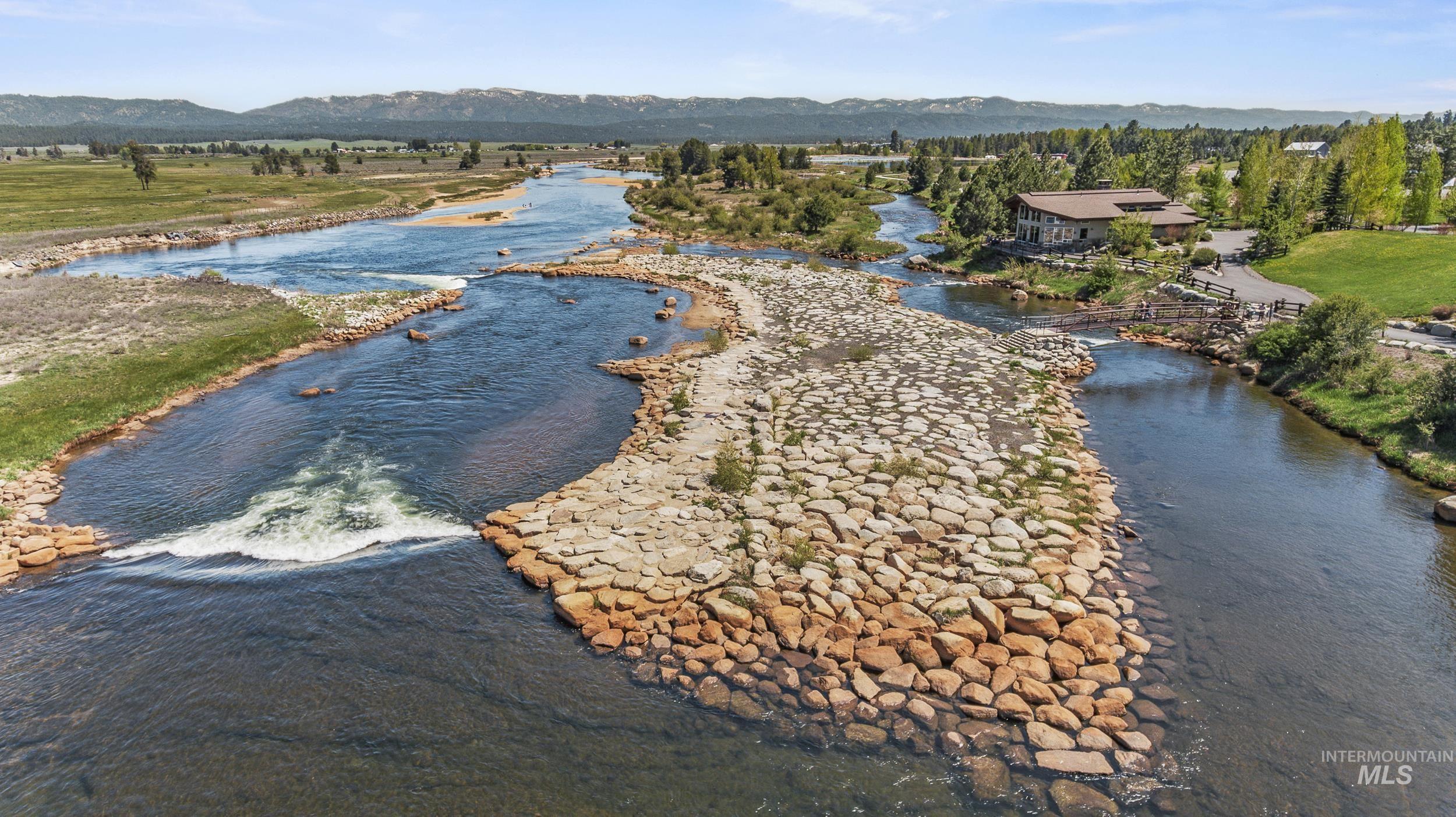 Drone / aerial view of a water and mountain view