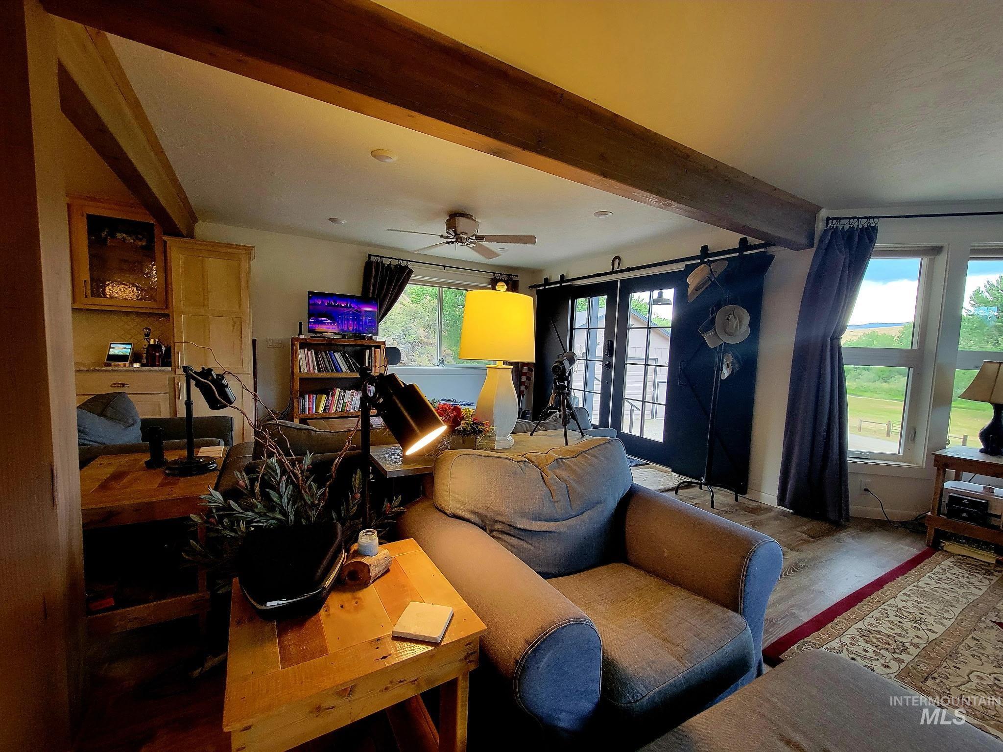 The spacious living room invites gatherings of every size, with plenty of room to relax and entertain