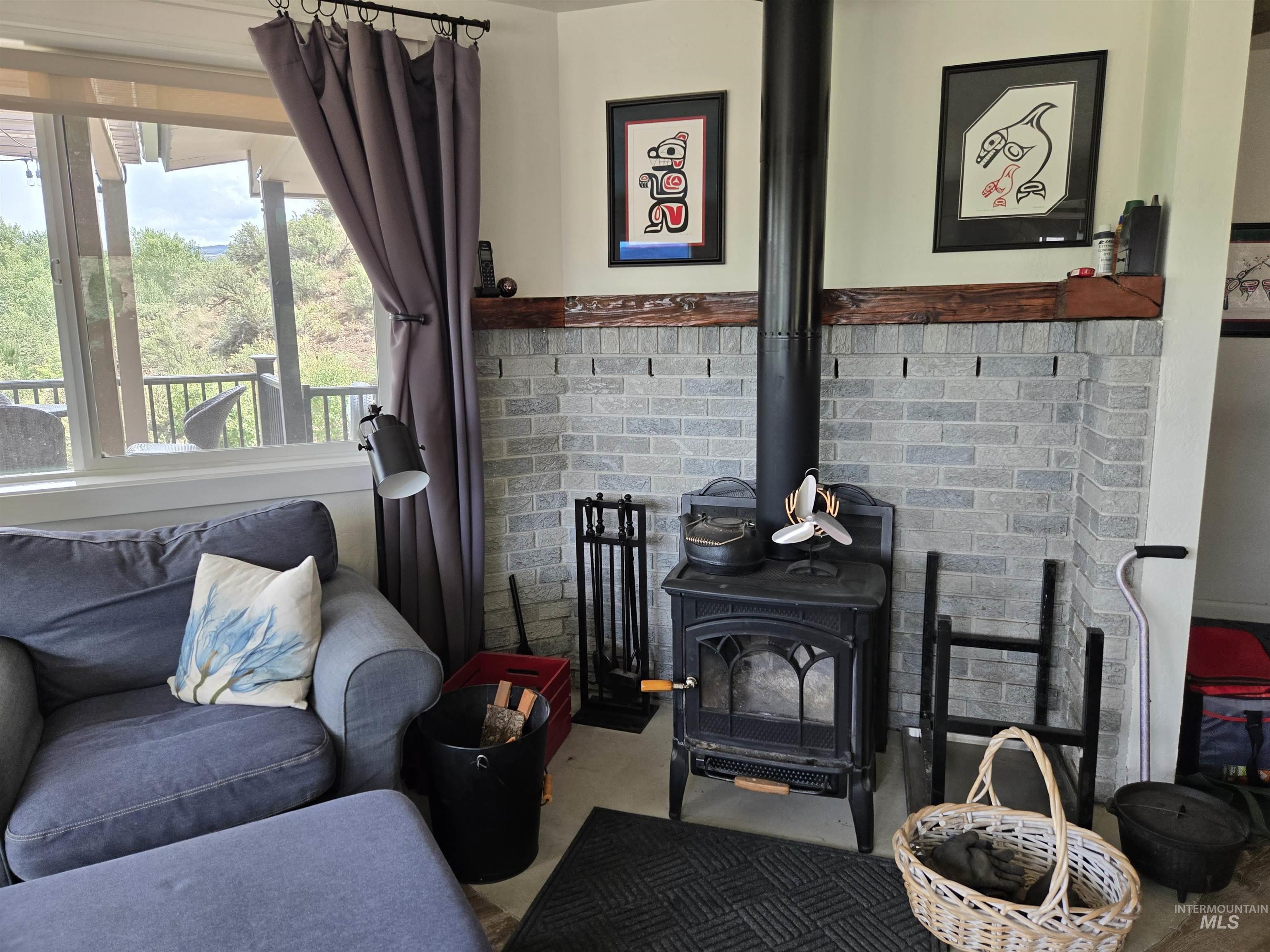 A wood stove adds both practicality and atmosphere to the living area
