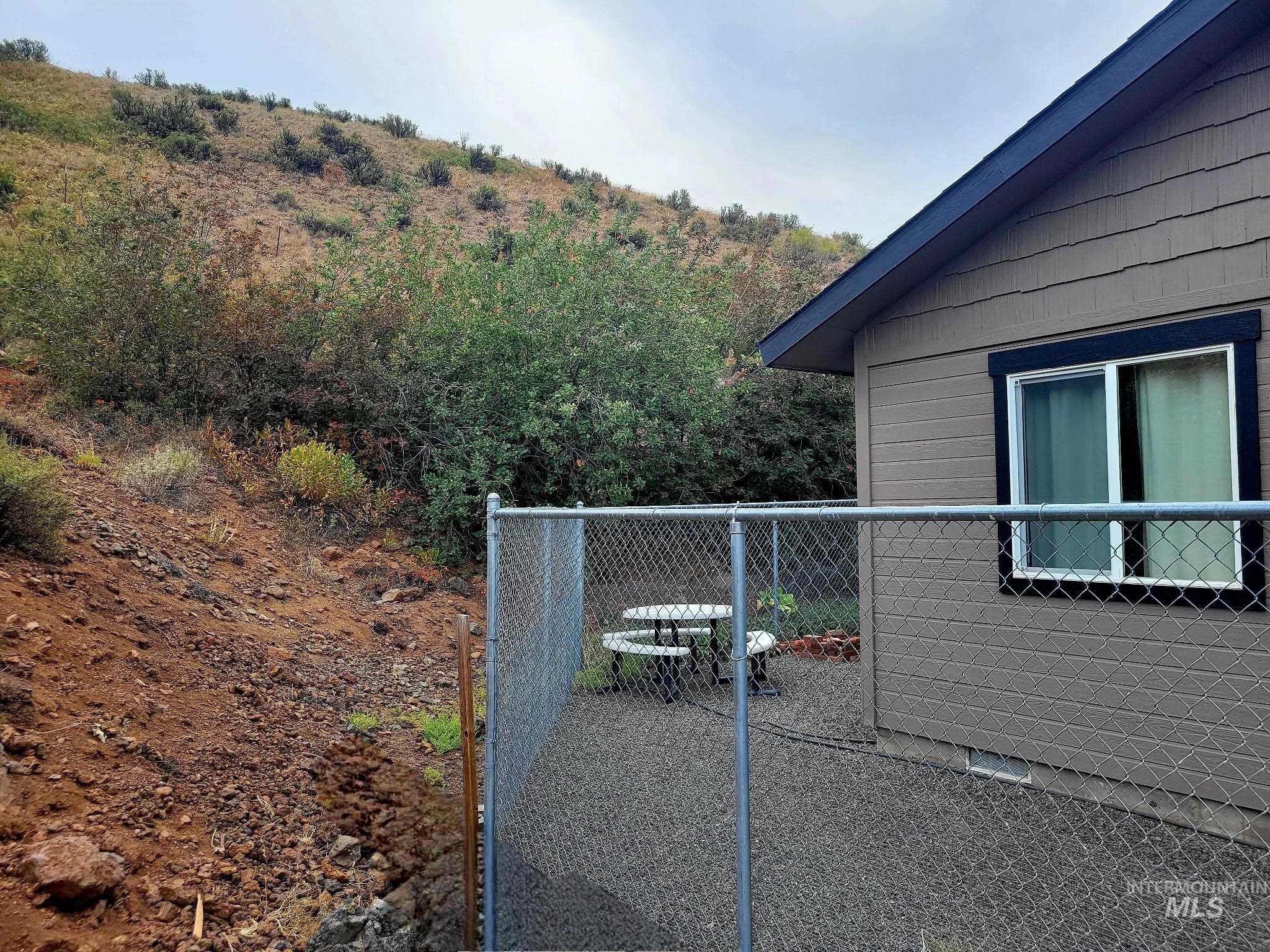 Pet owners will love the fenced and graveled dog run?easy to clean and perfect for keeping paws mud-free