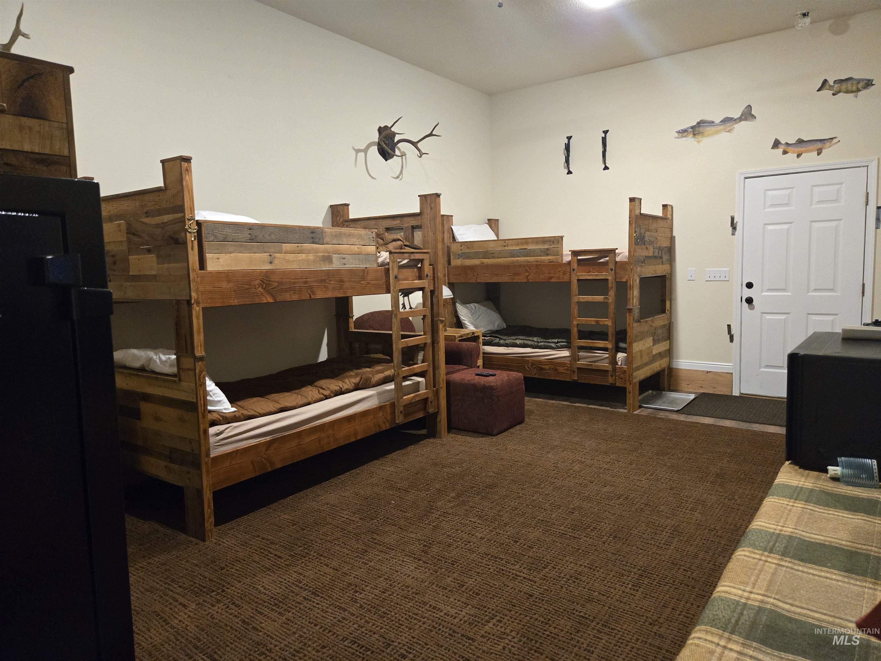 No guests? No problem. The bunkhouse transforms into a cozy private den just for you.