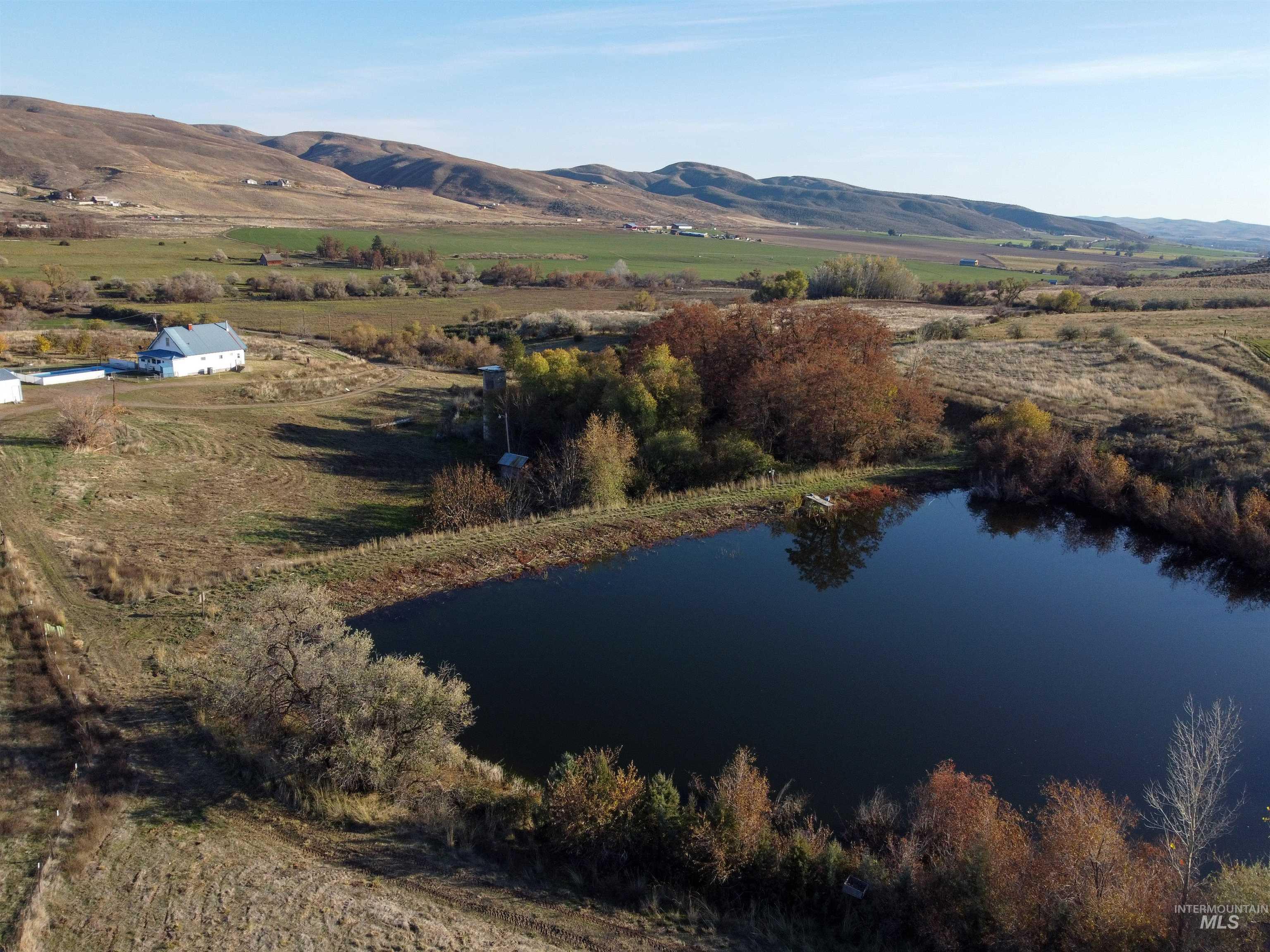 Overview of rural landscape with a water and mountain view