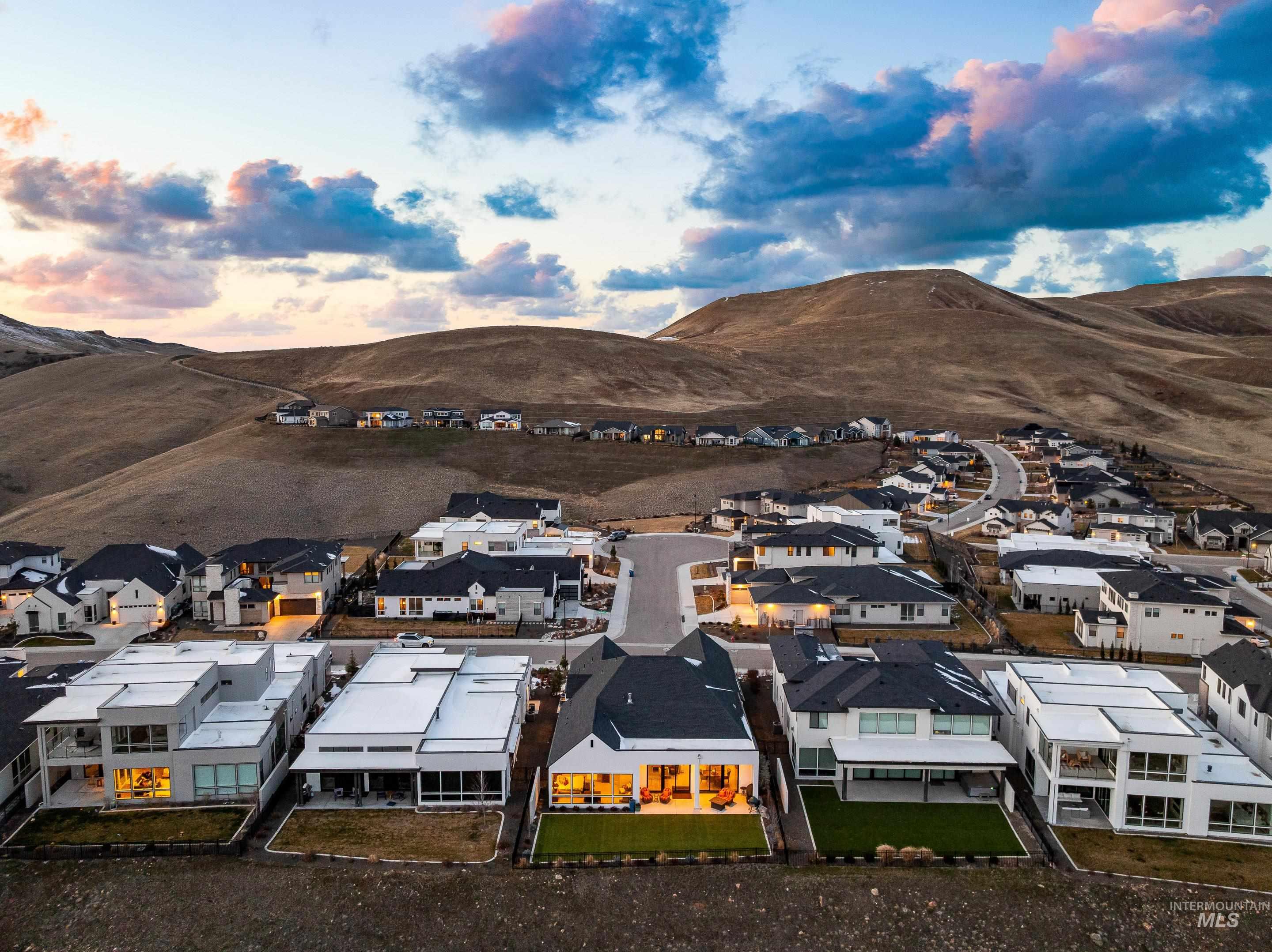 Aerial view of residential area with mountains
