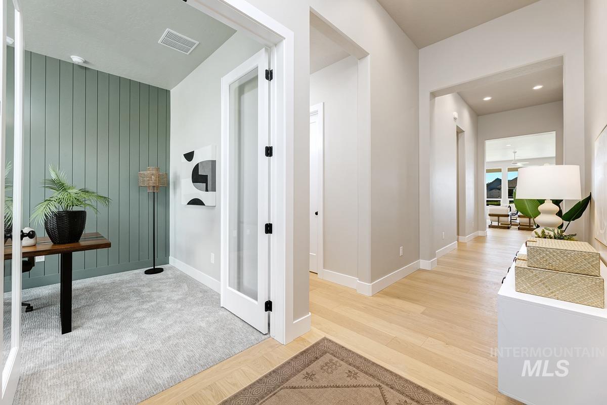 Hallway featuring a desk, recessed lighting, and light wood-style floors
