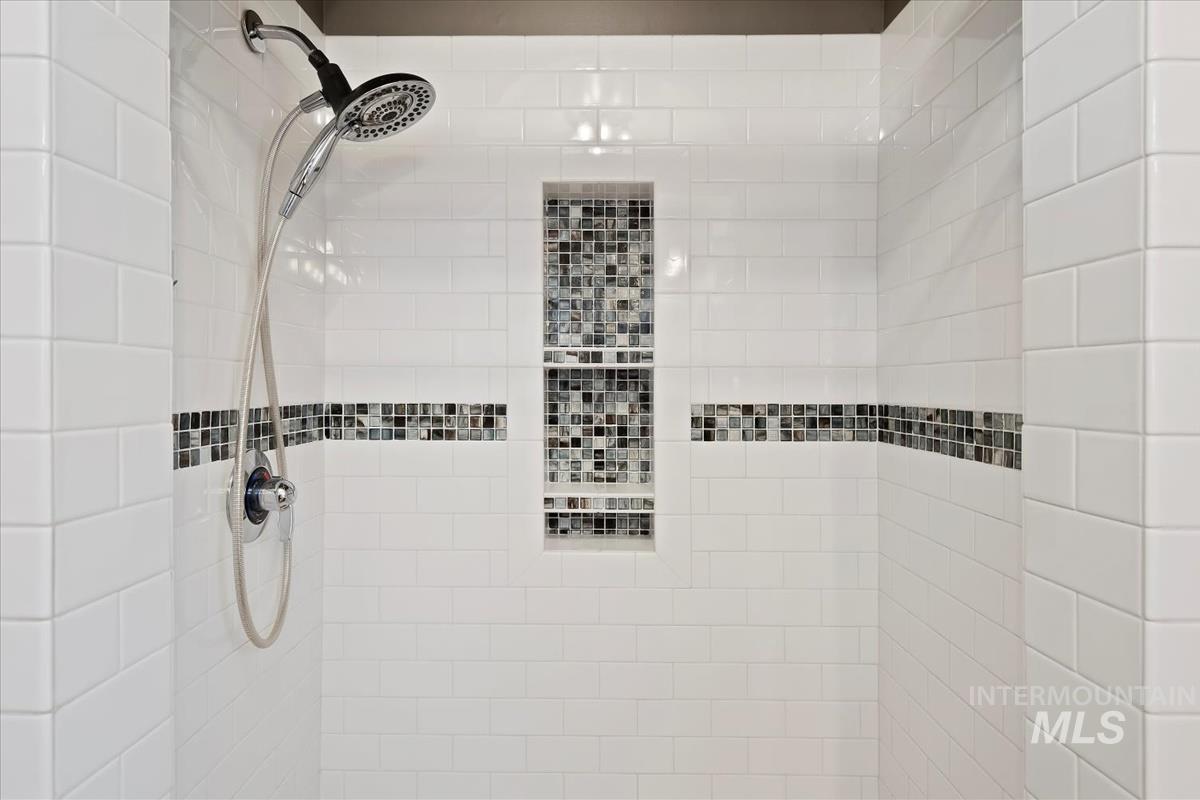 Bathroom view of tiled shower