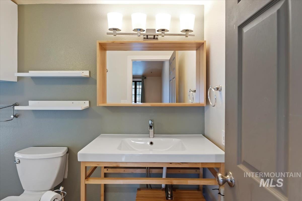 Bathroom featuring a sink and toilet