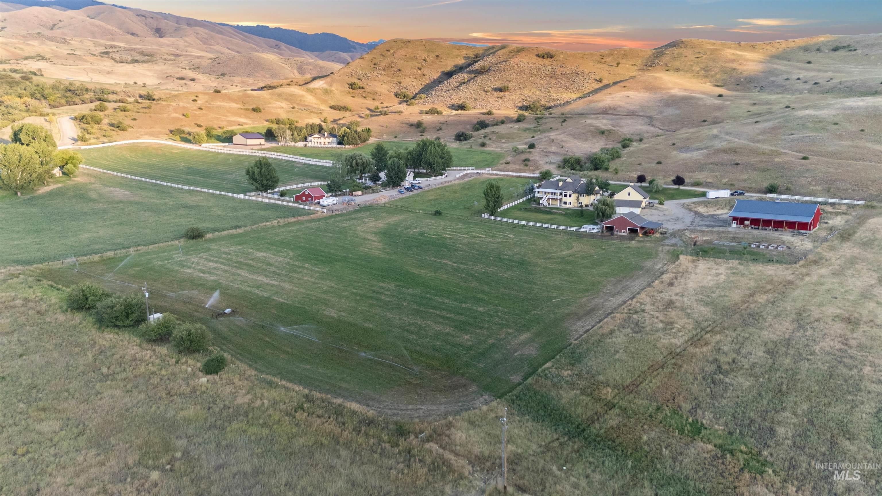 View of property location with a mountain backdrop and rural landscape