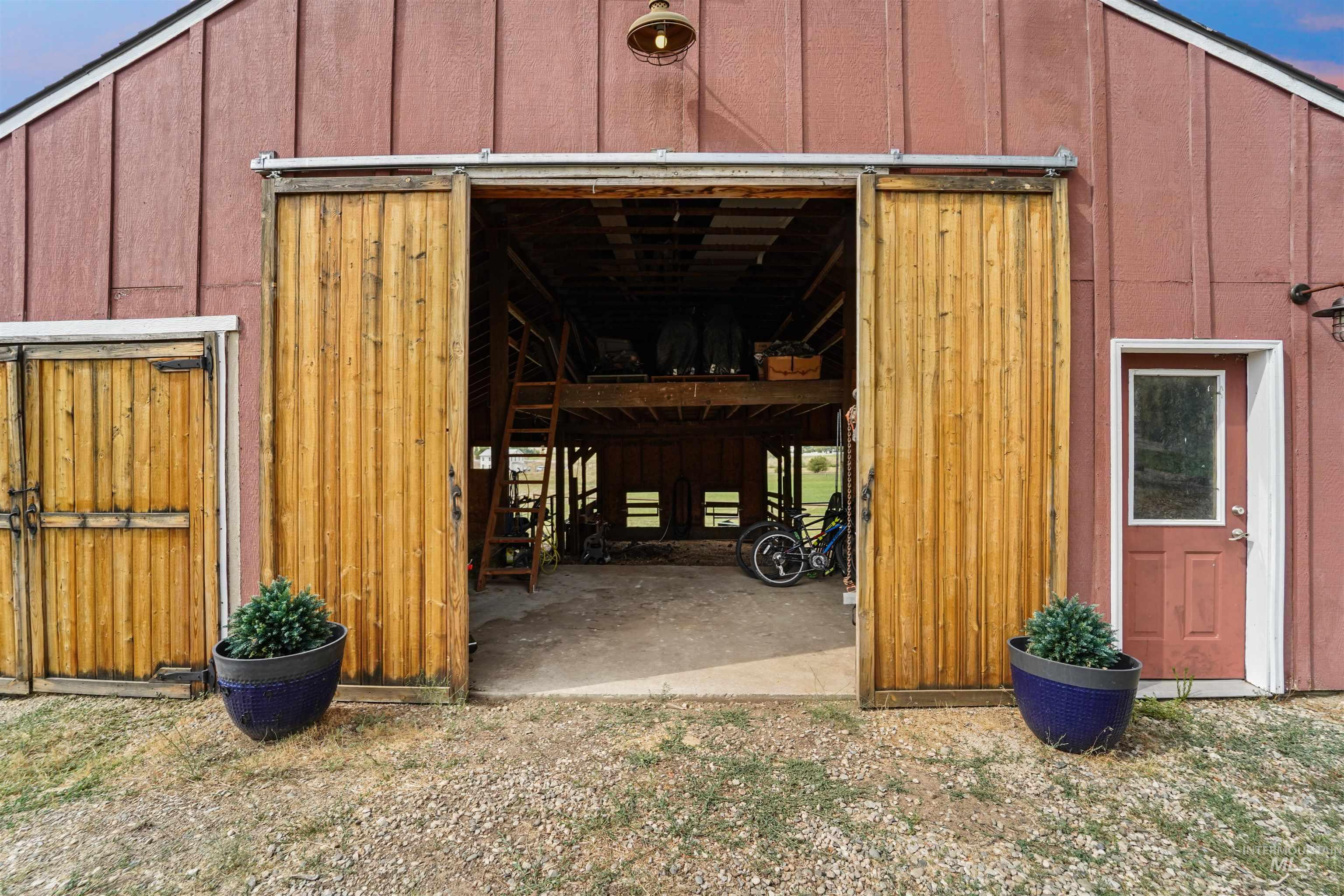 View of outdoor structure with an exterior structure and a garage