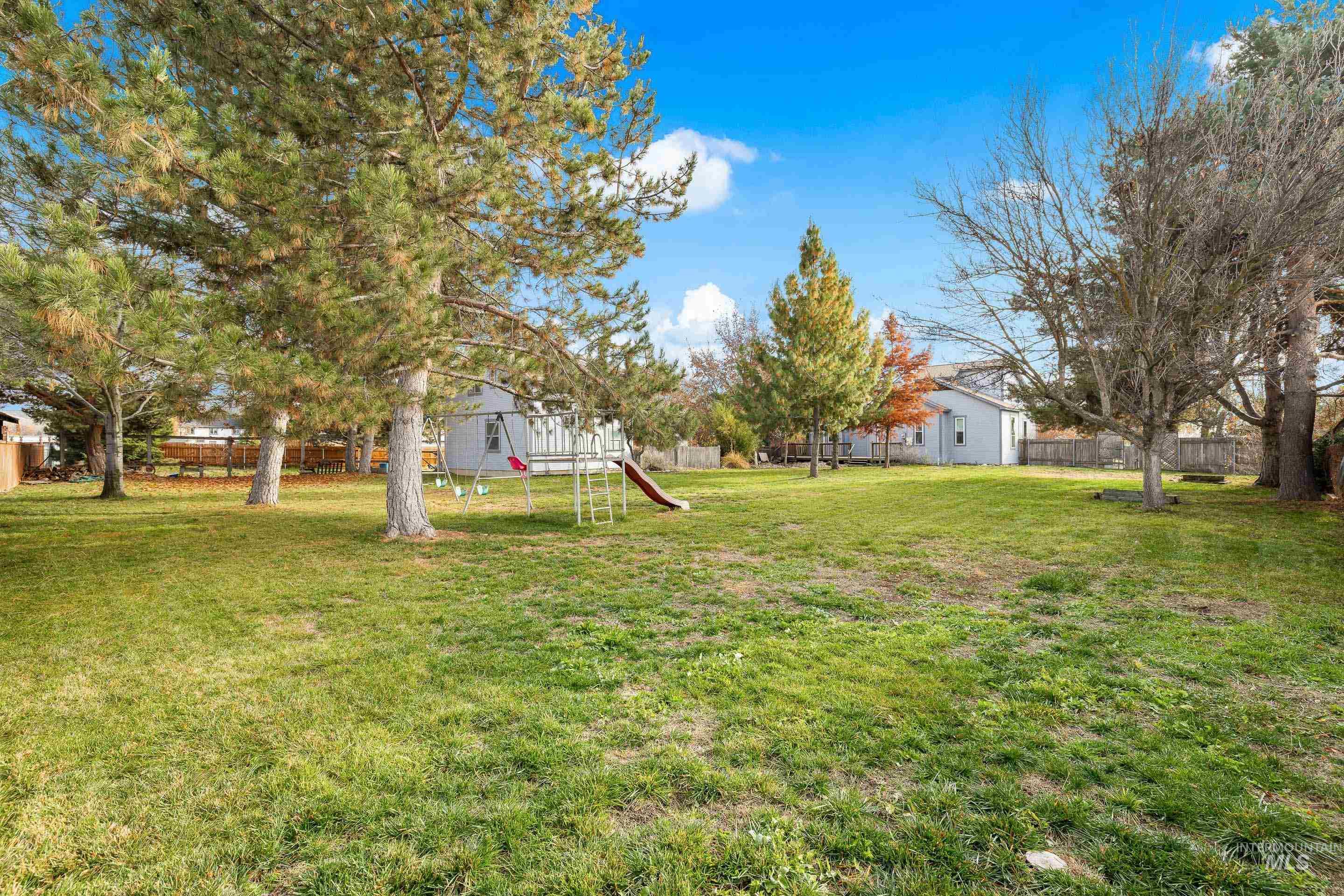 View of yard with a playground