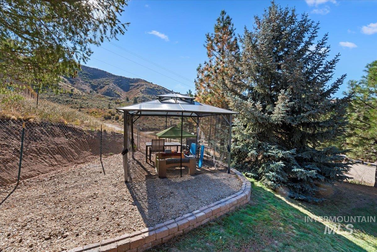 View of yard featuring a gazebo and a patio