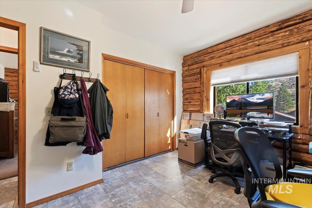 Office area featuring baseboards