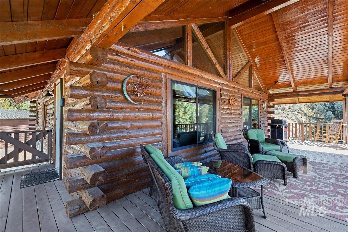 Deck featuring a grill