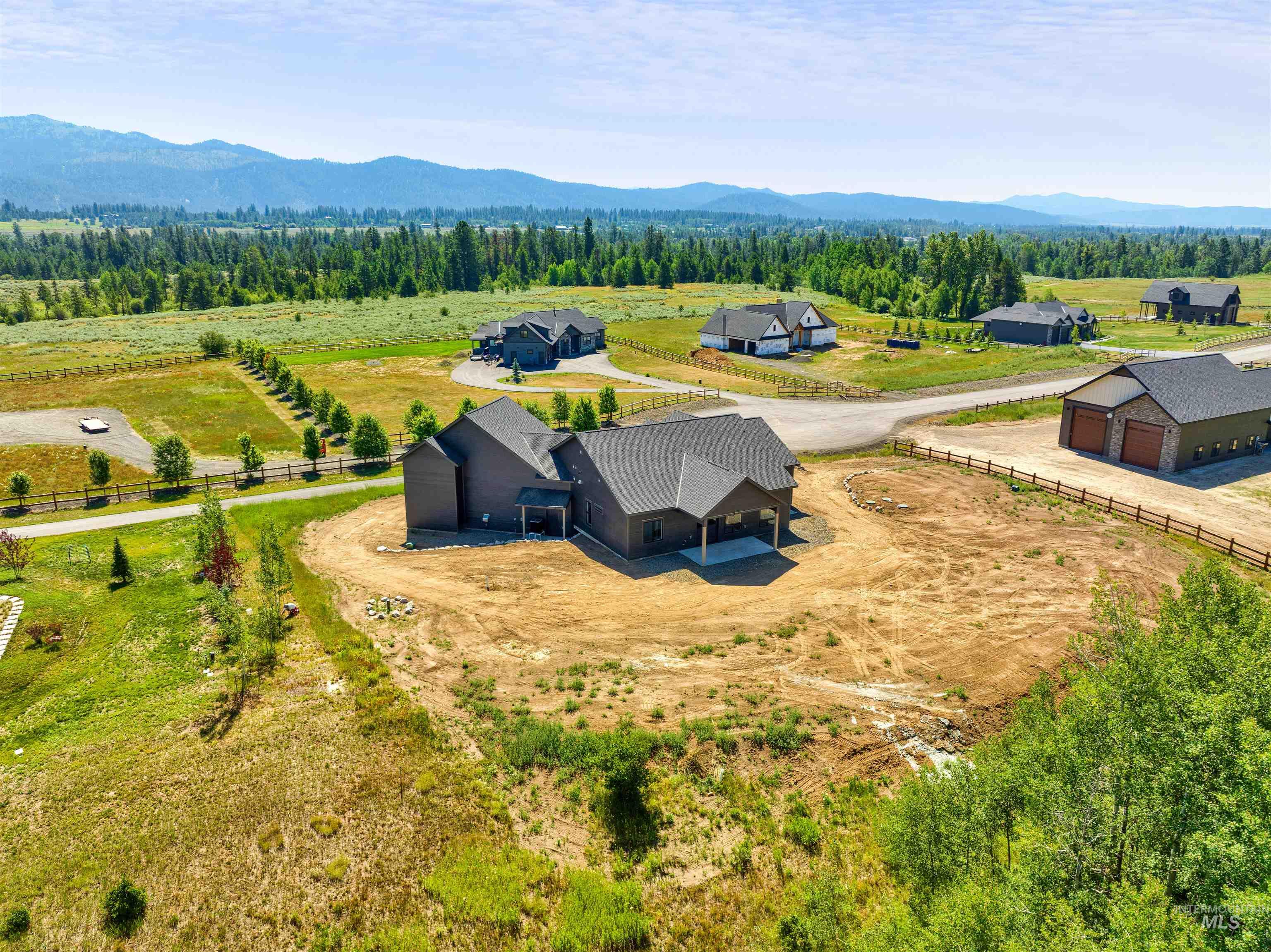 Overview of rural landscape featuring a mountain backdrop