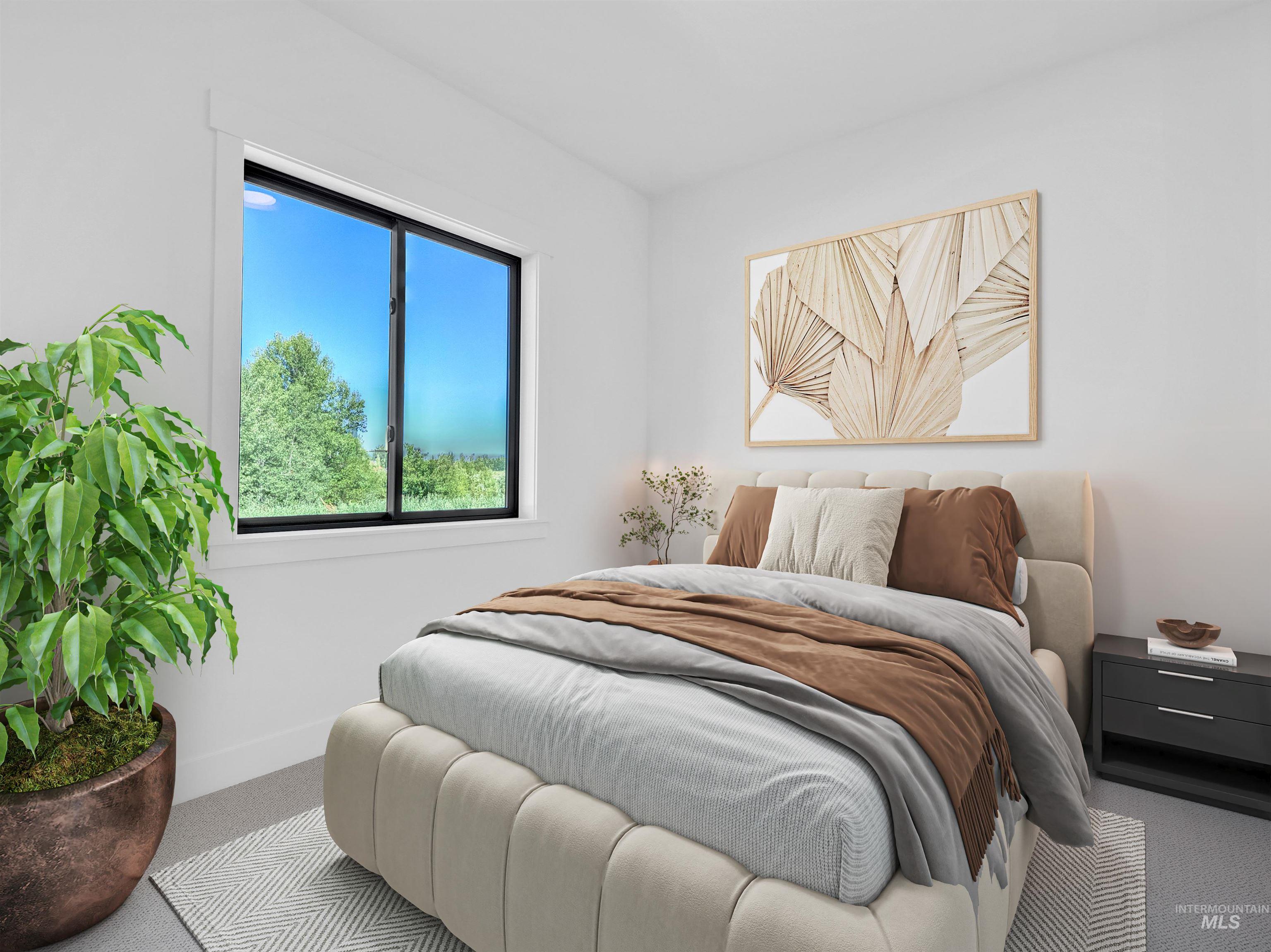Carpeted bedroom featuring baseboards