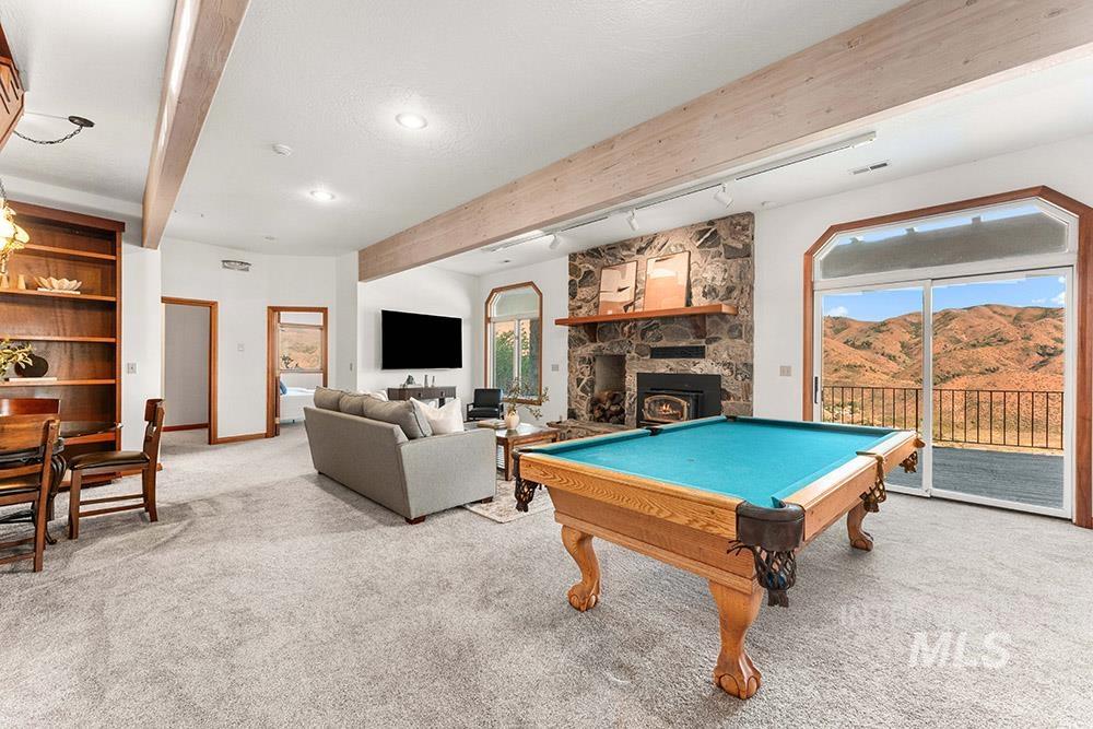 Rec room with light colored carpet, beamed ceiling, pool table, and recessed lighting
