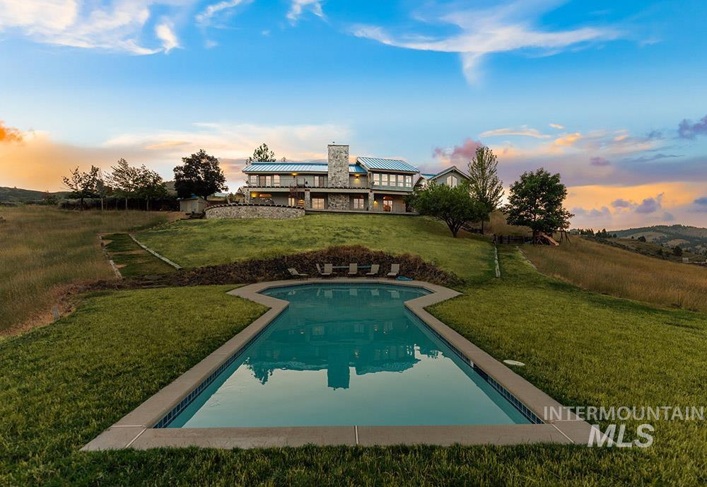 Outdoor pool with a yard