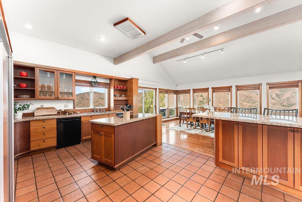 Kitchen with open shelves, black appliances, light tile patterned floors, brown cabinetry, and recessed lighting