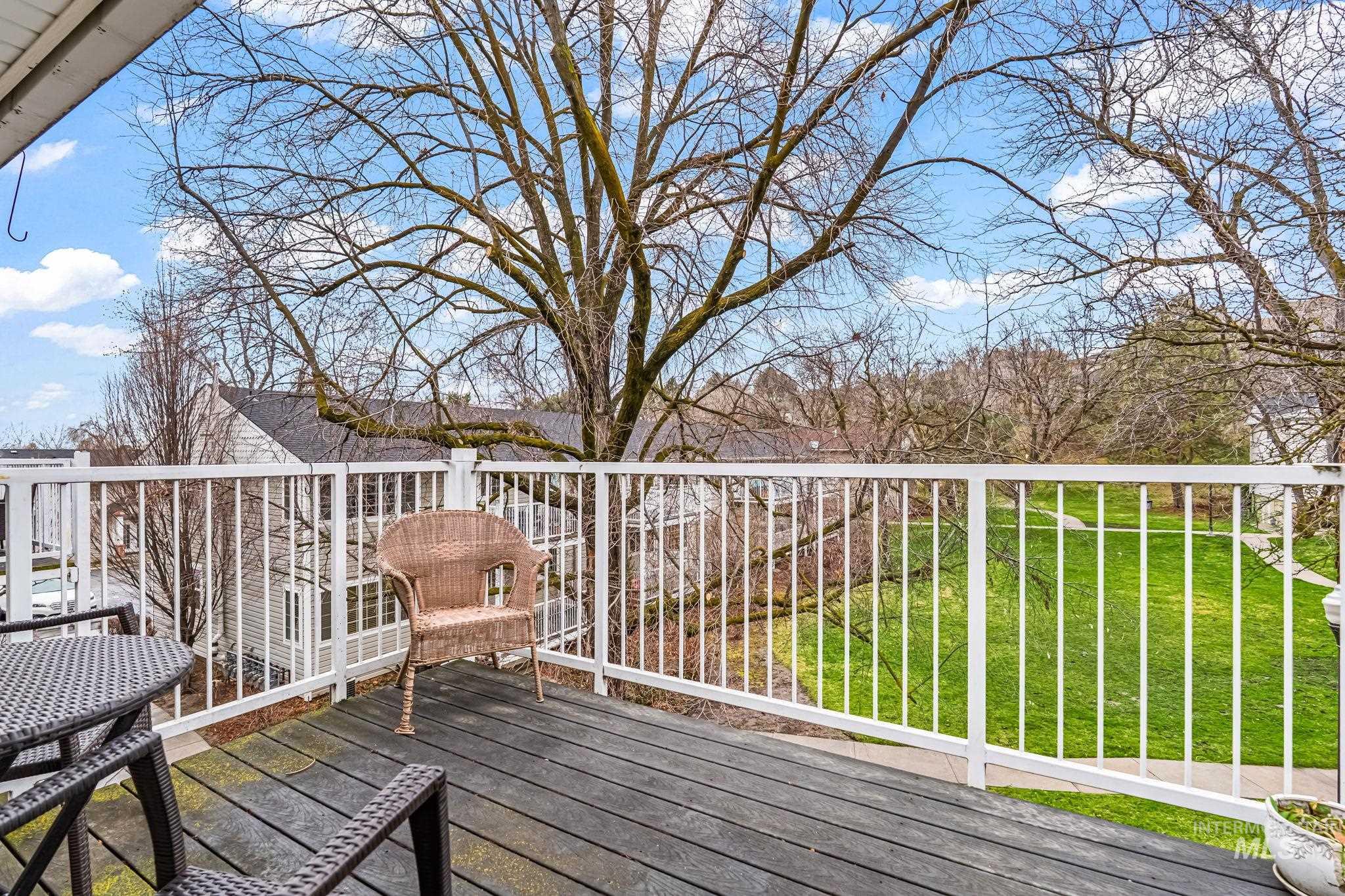 Two patios with views of greenspace and common area
