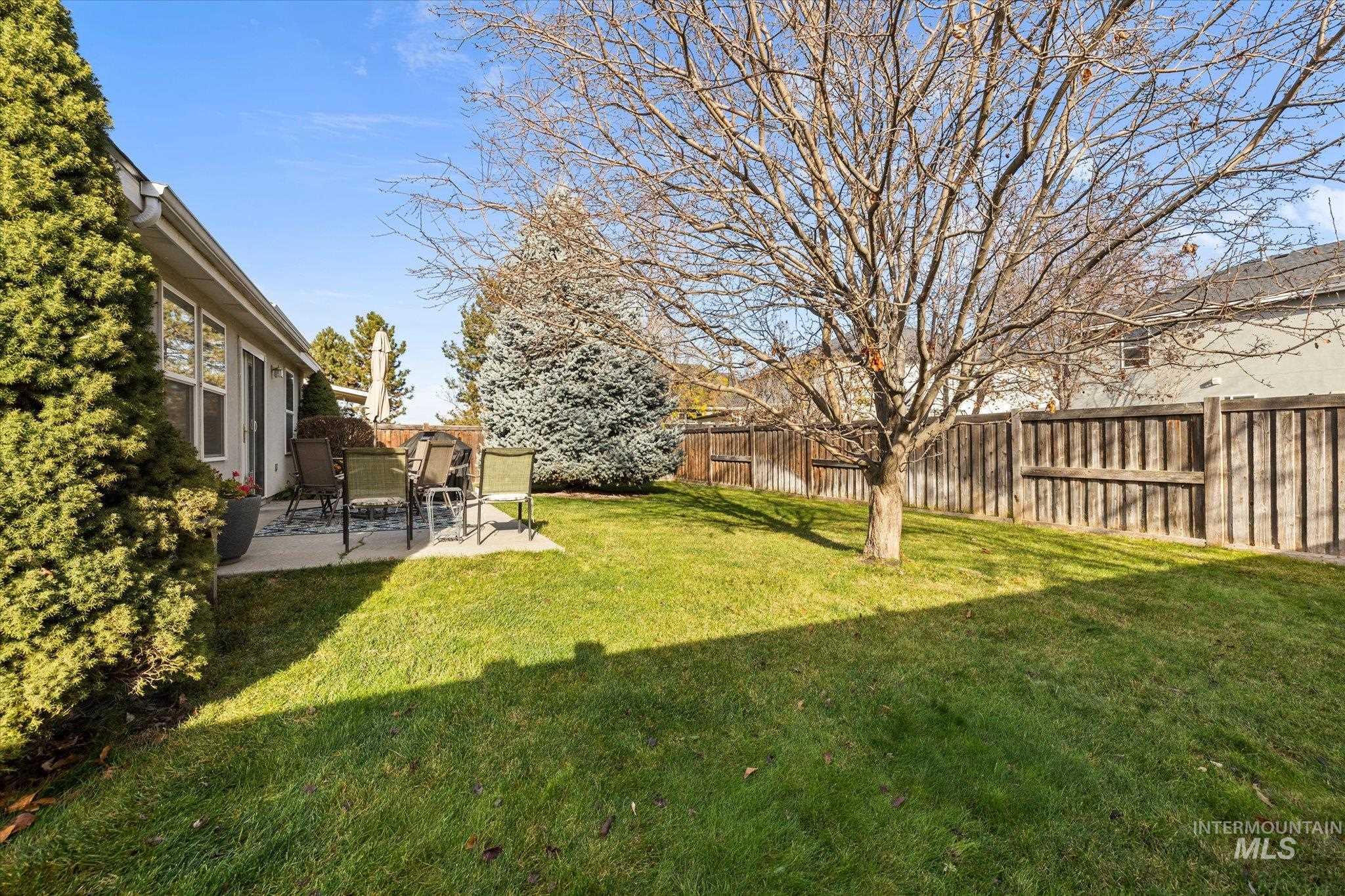 Fenced backyard featuring a patio area