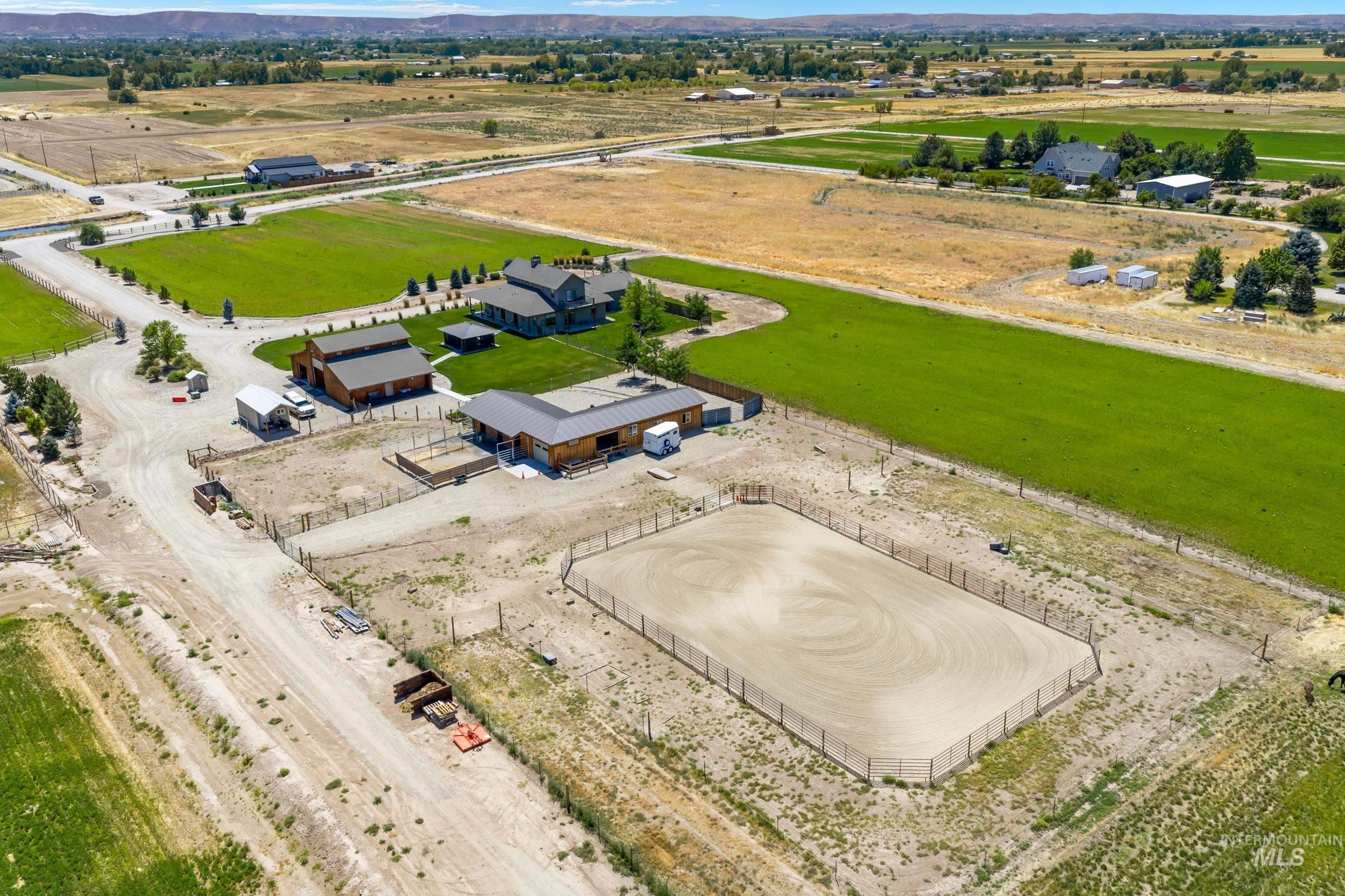 Overview of rural landscape featuring a mountain backdrop
