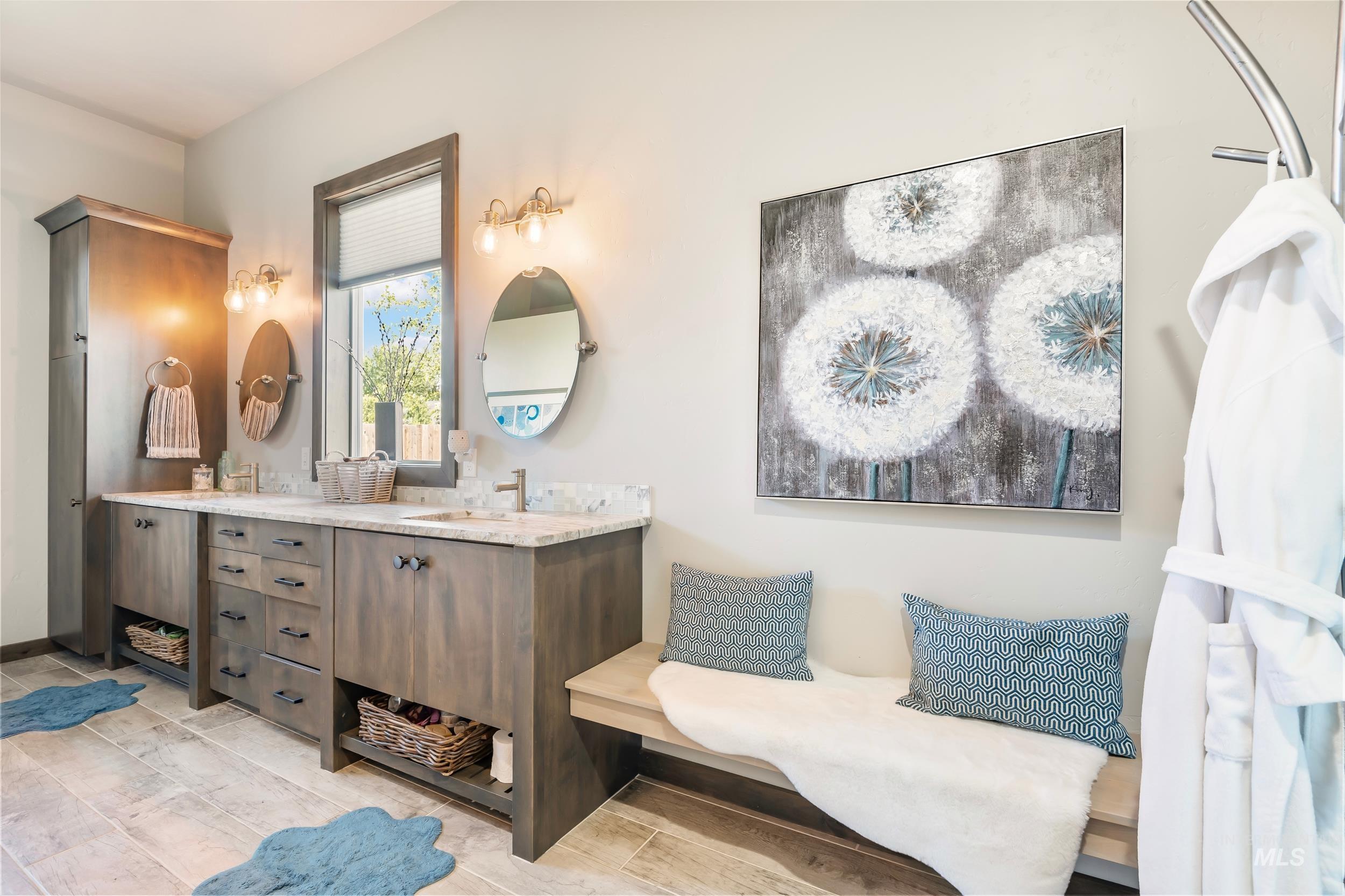Full bath featuring double vanity