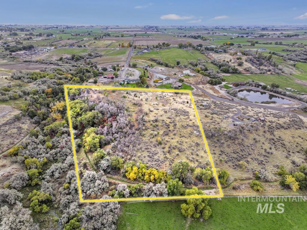 Overview of rural landscape featuring property parcel outlined