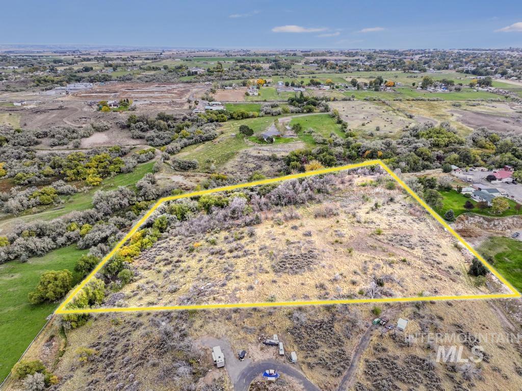 Overview of rural landscape featuring property parcel outlined