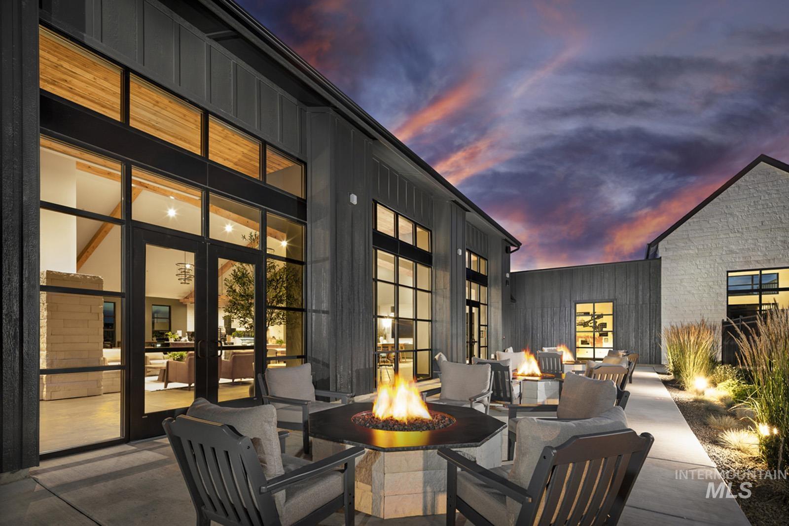 View of patio / terrace featuring an outdoor fire pit