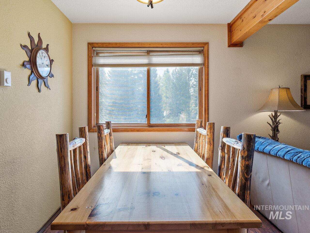 Dining area with a textured wall