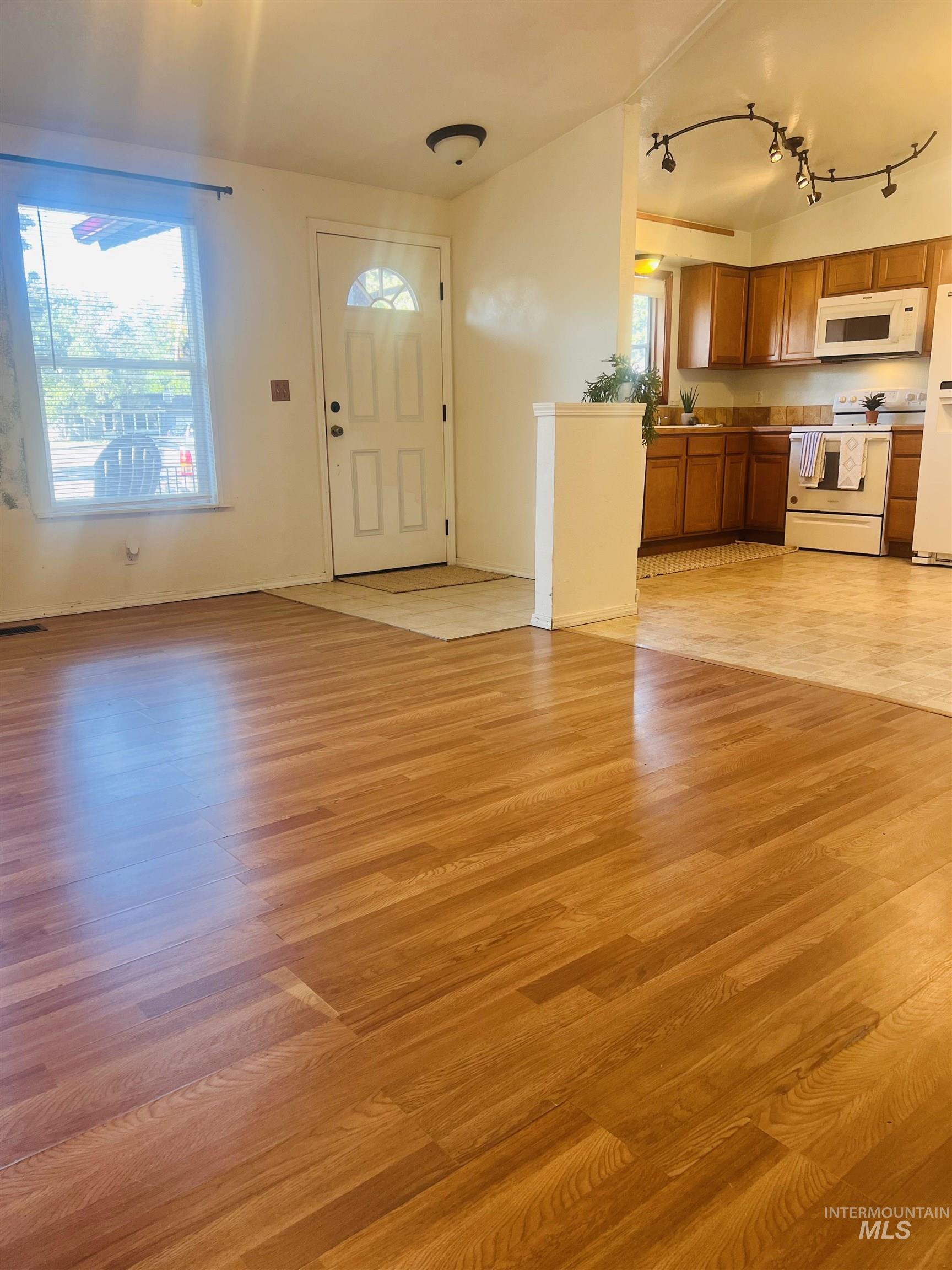 Wood-finish flooring throughout the main living area