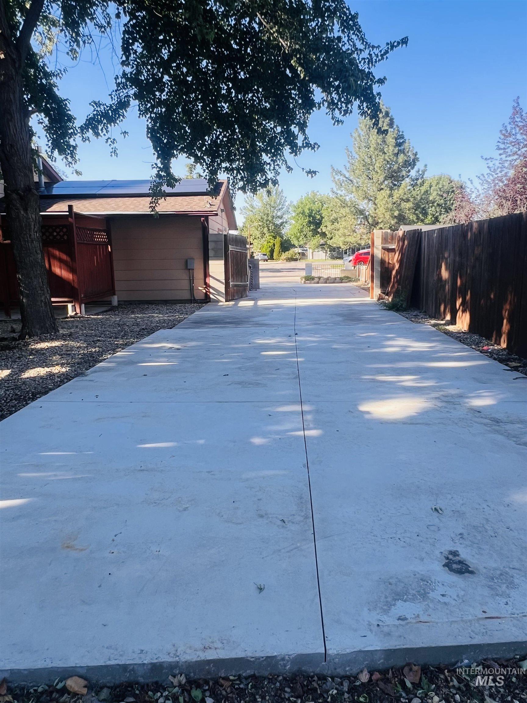 42' length slab of concrete East side of house with 220 amp power ran underground beside it.  Tons of future possibilities for shop, RV, trailers, or recreational vehicles.