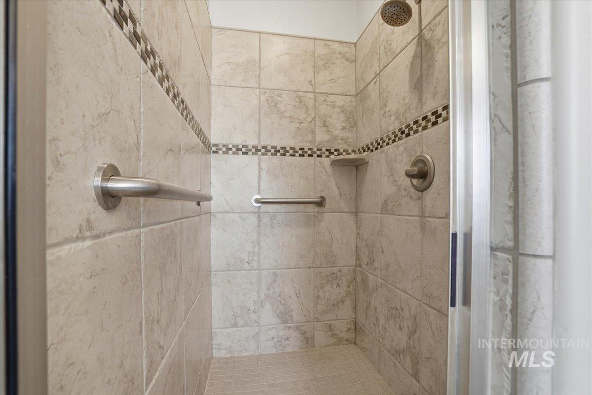 Bathroom featuring a stall shower