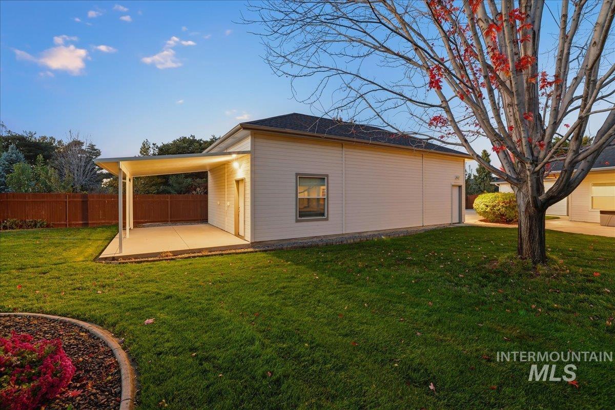 Rear view of property with a patio