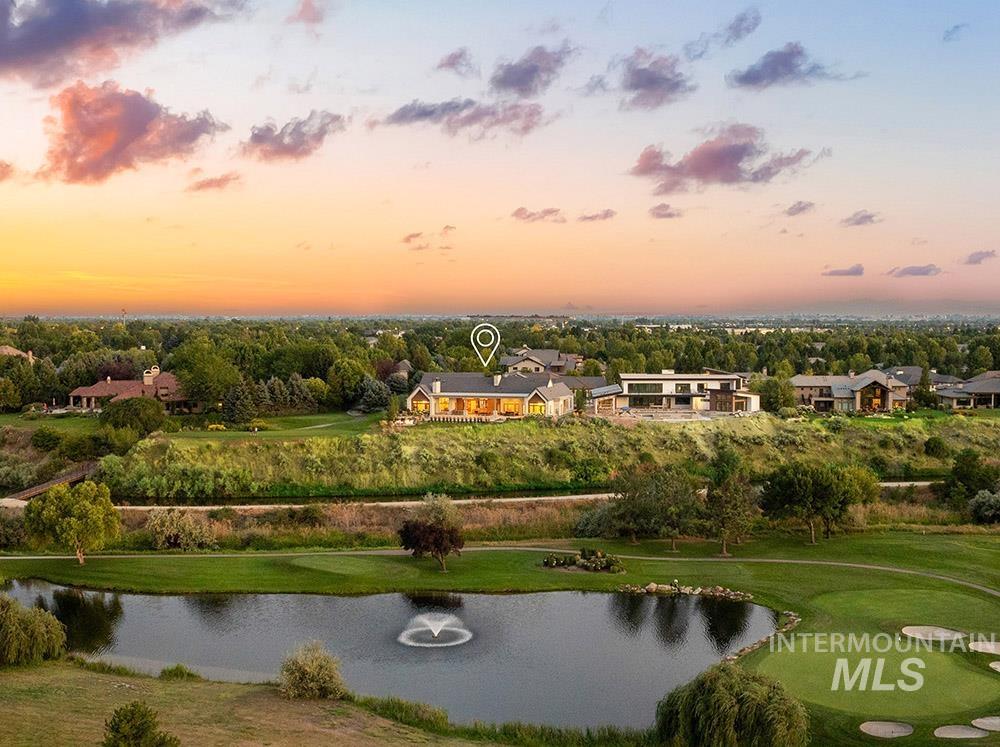 Bird's eye view of a nearby body of water and a golf course