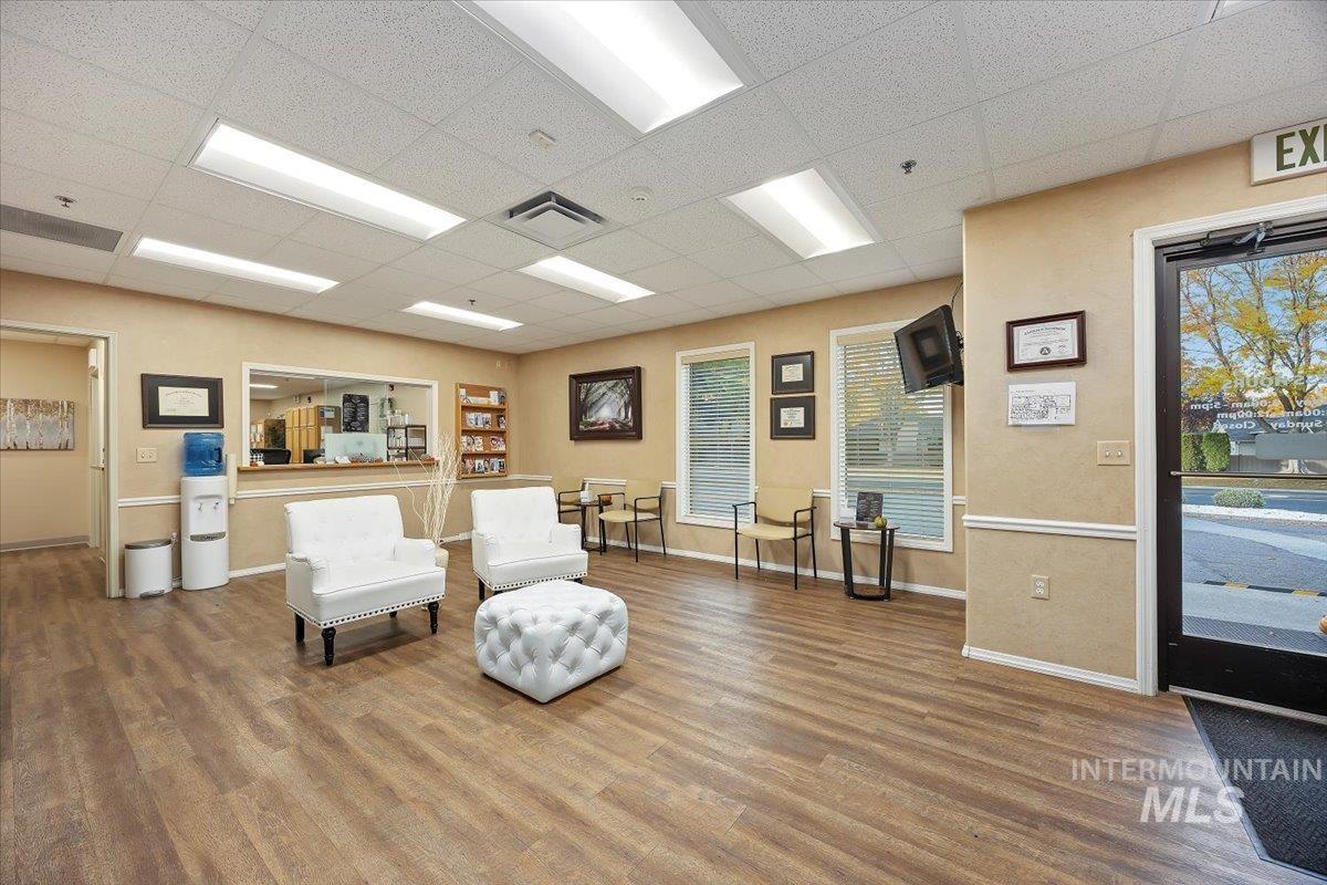 Living area with a paneled ceiling