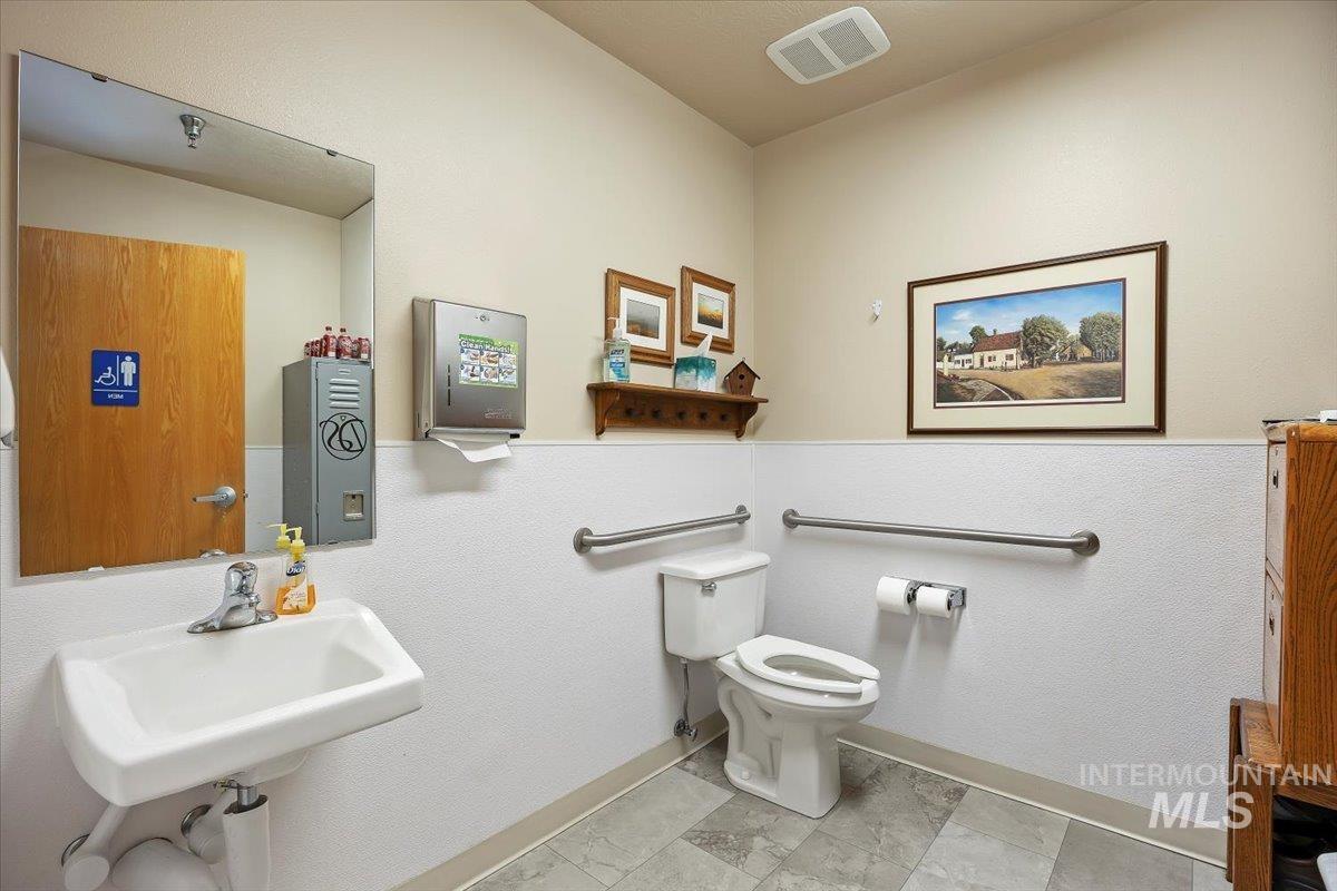Bathroom with a sink and toilet