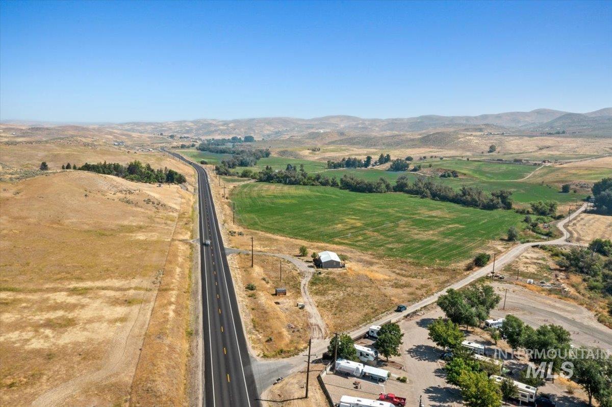 Aerial view of sparsely populated area featuring a mountain backdrop