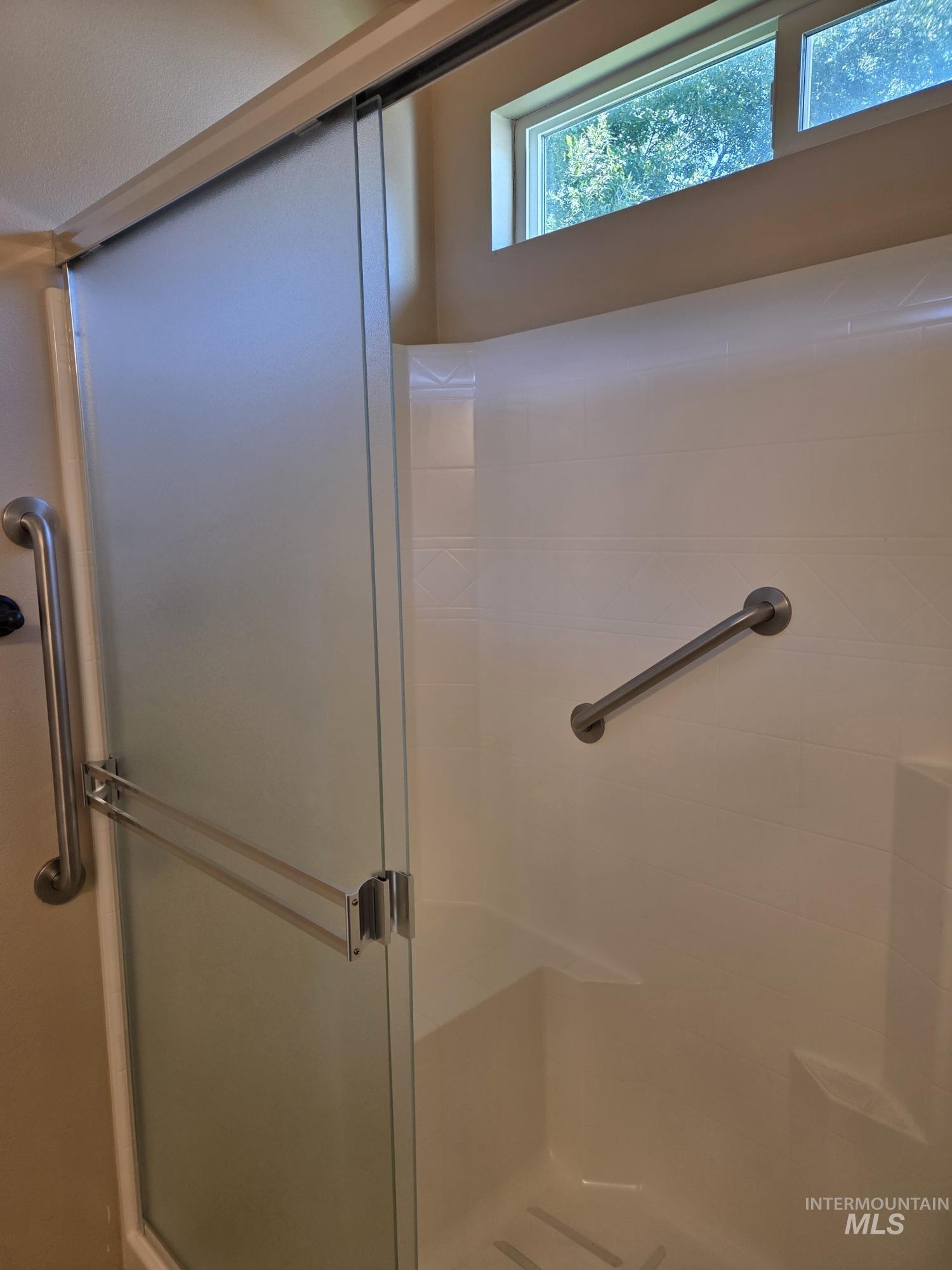 Bathroom with a shower stall