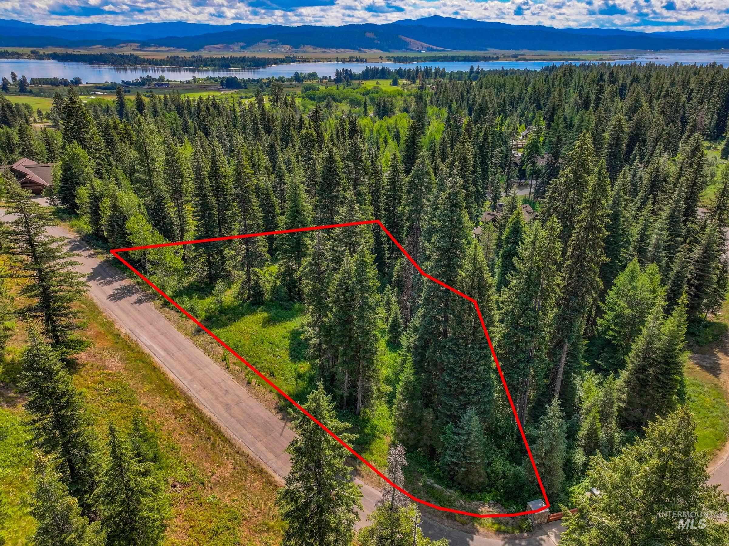 View of property location with property boundaries highlighted and a water and mountain view