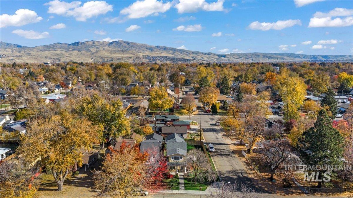 Aerial view of residential area with a mountainous background