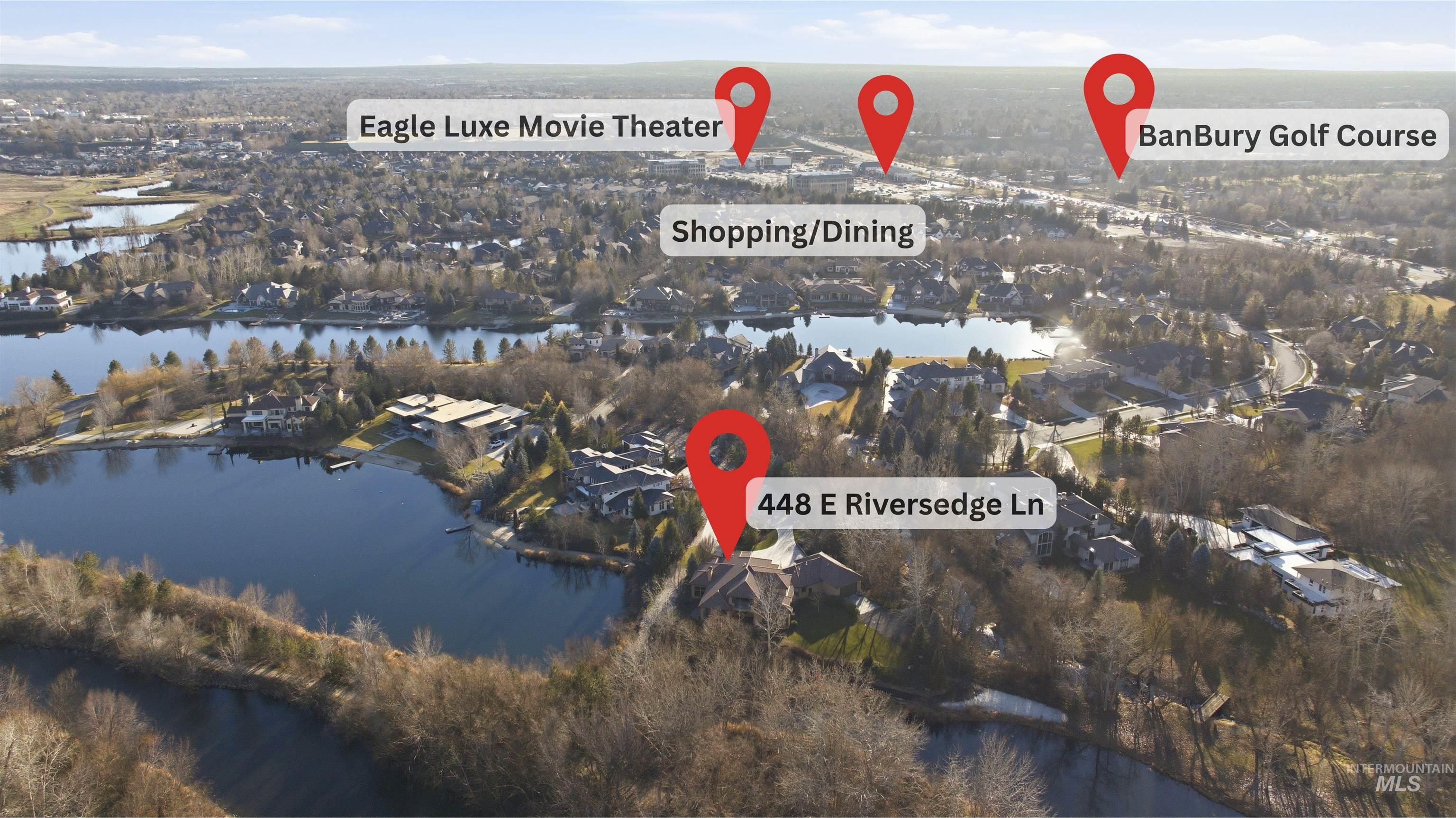 Aerial view of property's location with a nearby body of water